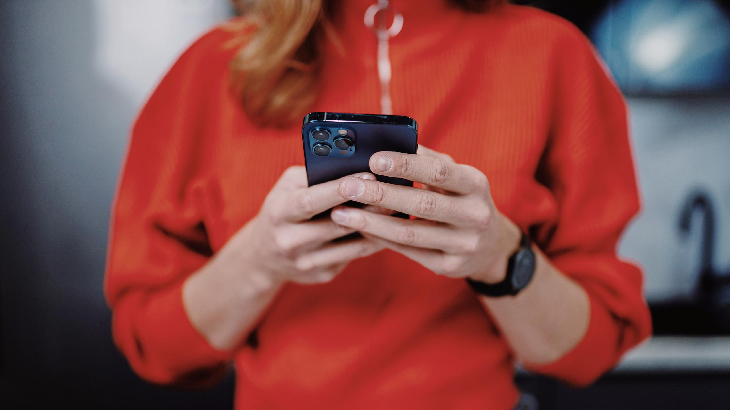 Photo of a person using an iPhone