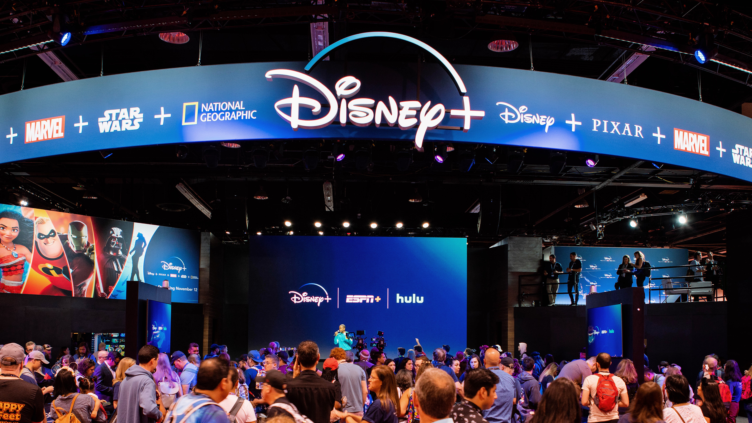 Photo of Disney+ booth featuring logos of Disney's streaming services