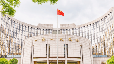 China Makes Surprise Rate Cuts Following Top Policy Meeting