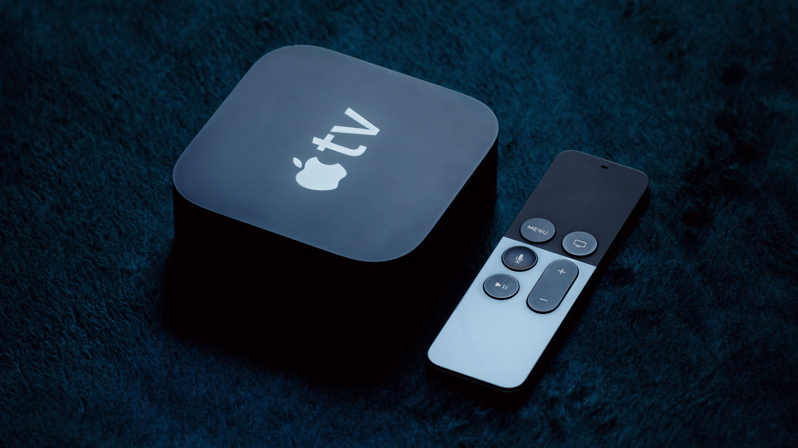 Photo of an Apple TV system and remote