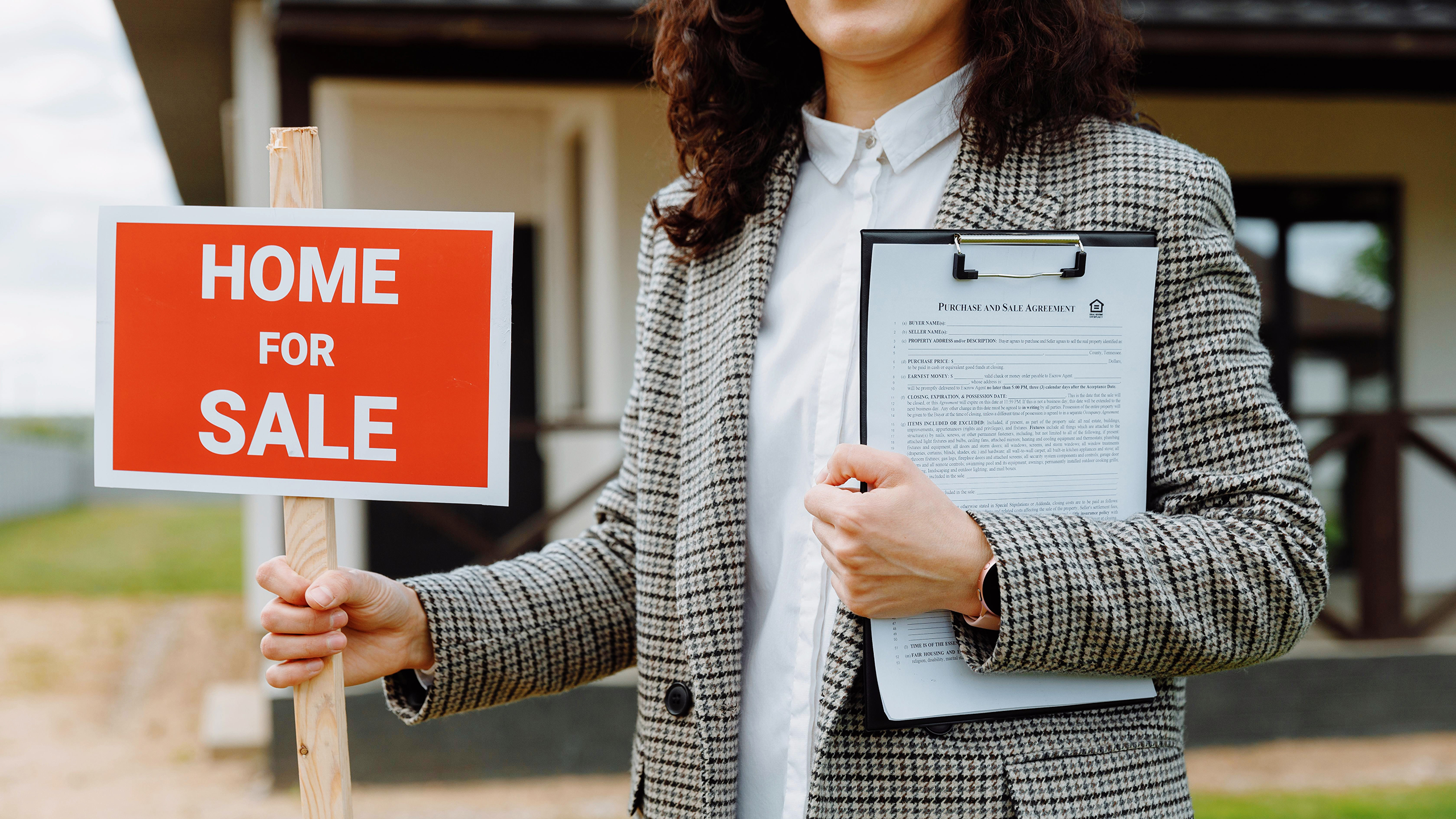 Photo of a Home For Sale sign