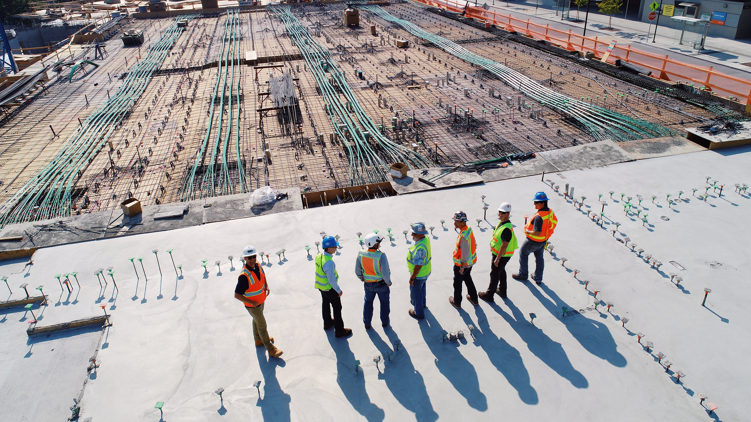 Photo of a construction site and workers