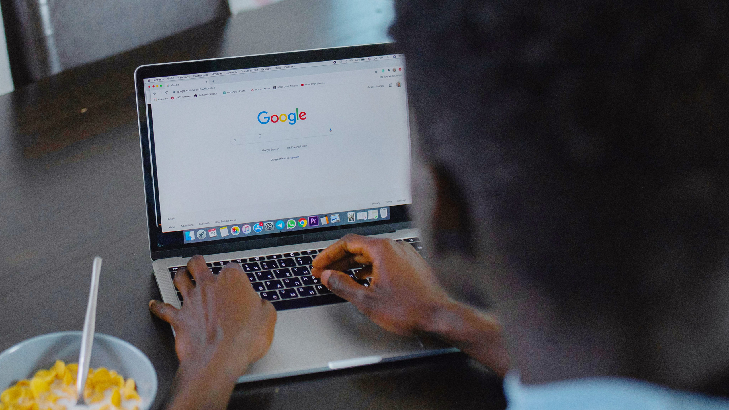 Photo of a person searching on Google