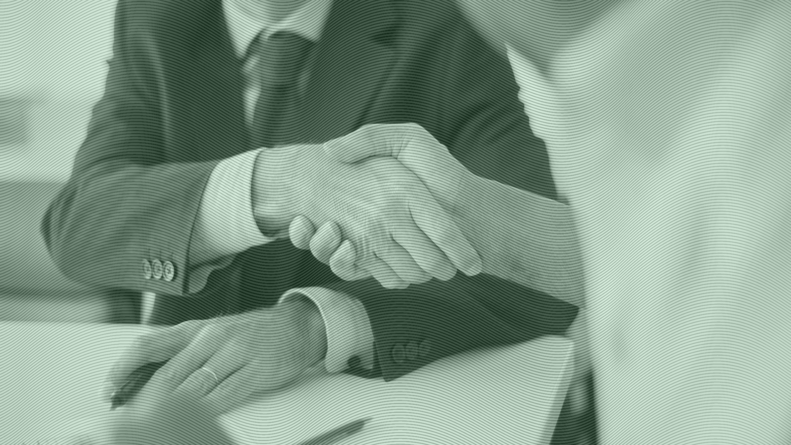 Photo of people shaking hands at a business meeting
