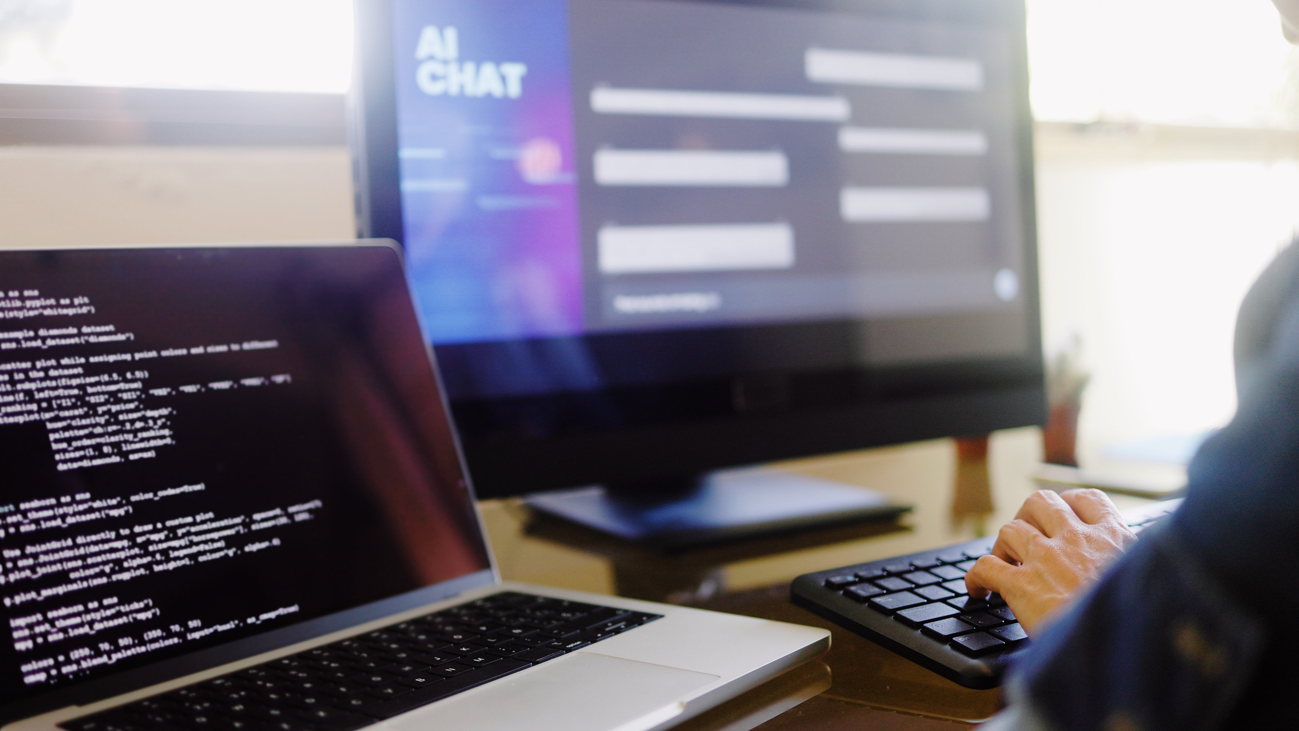 Photo of a programmer using an AI chatbot at work
