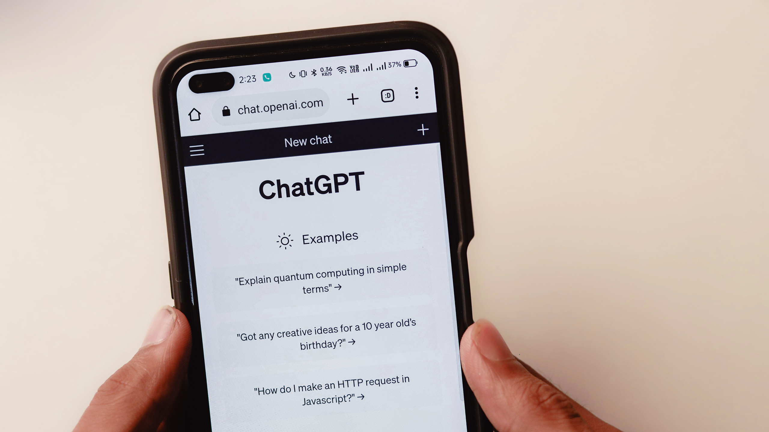 Photo of a person using ChatGPT on a phone