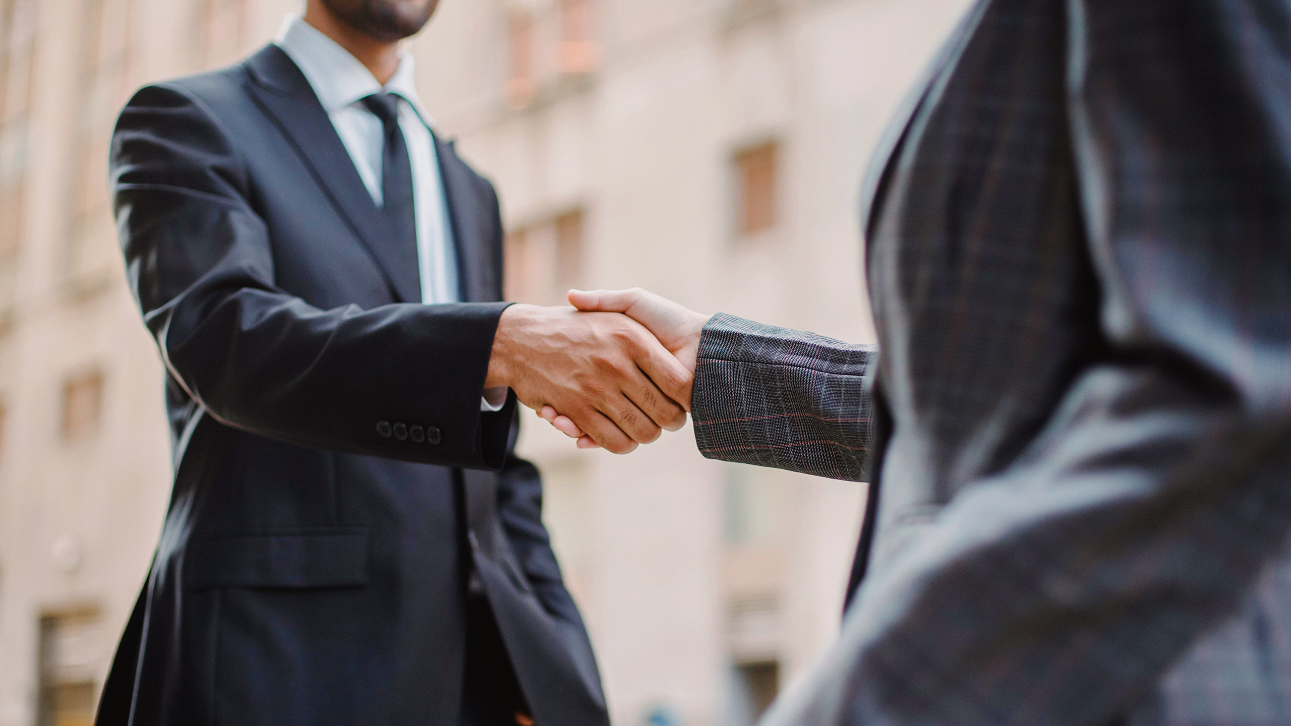 Photo of a business deal handshake