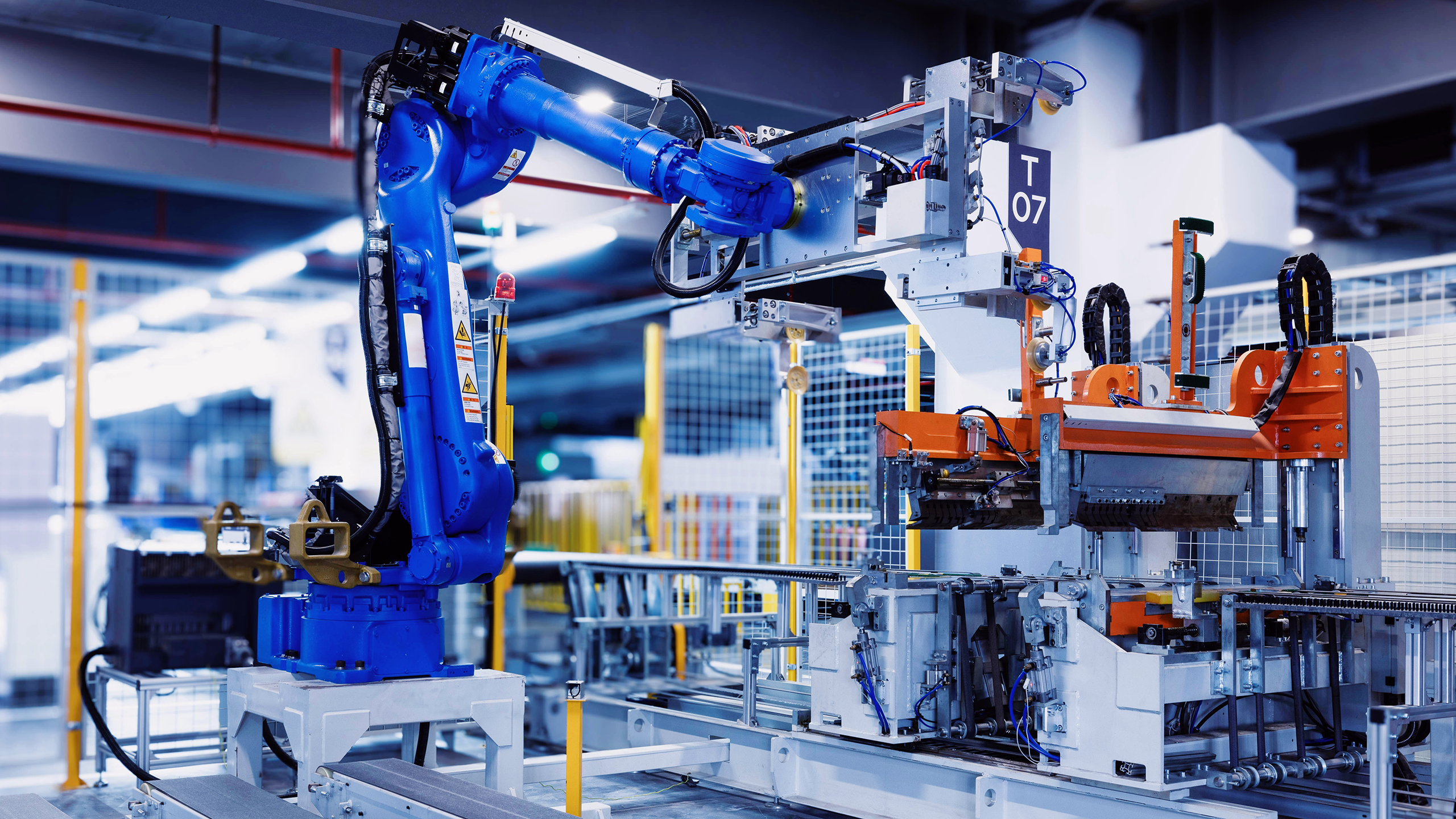 Photo of a robot in an assembly line