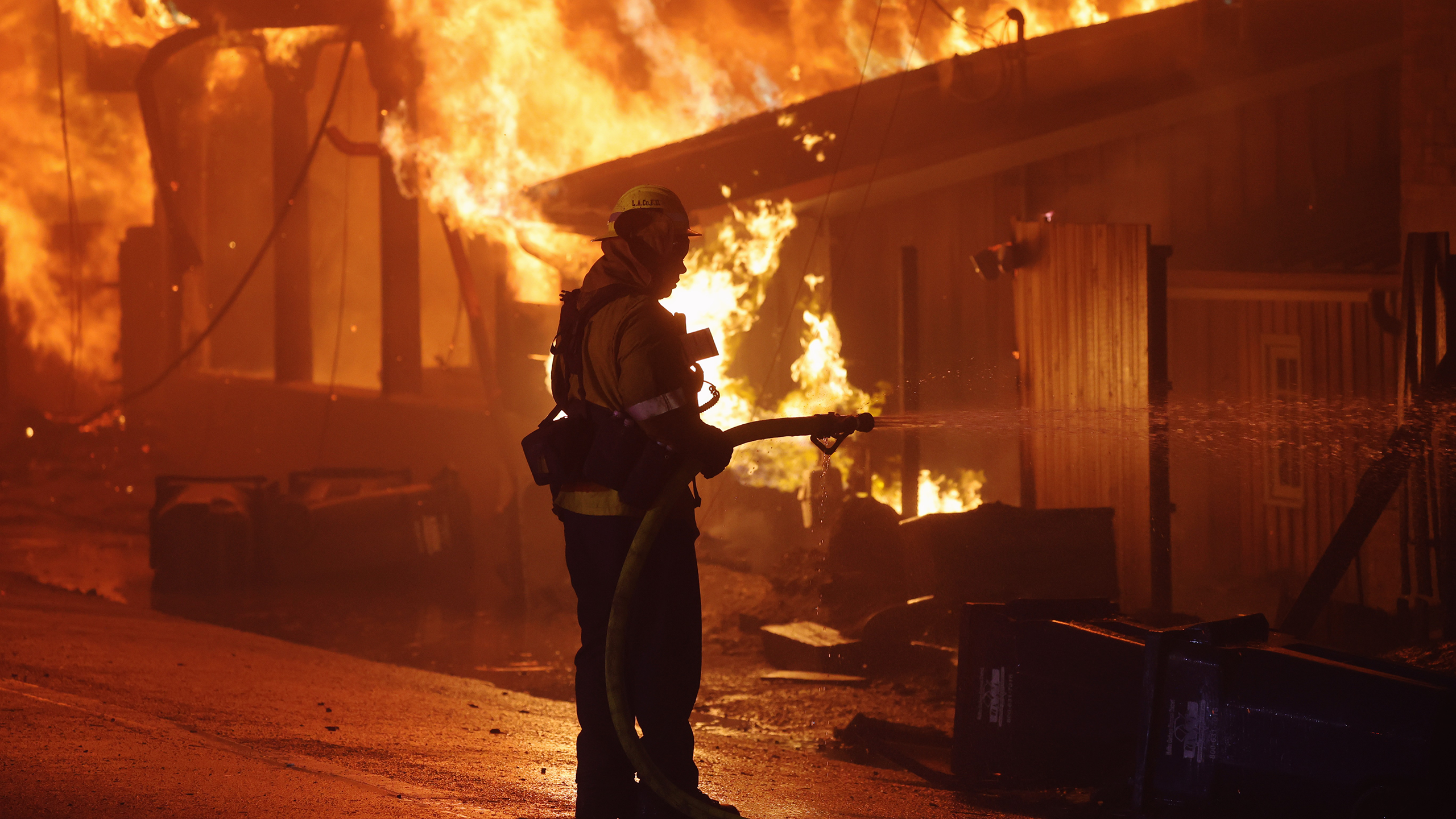 Photo of a firefighter in the Palisades Fire