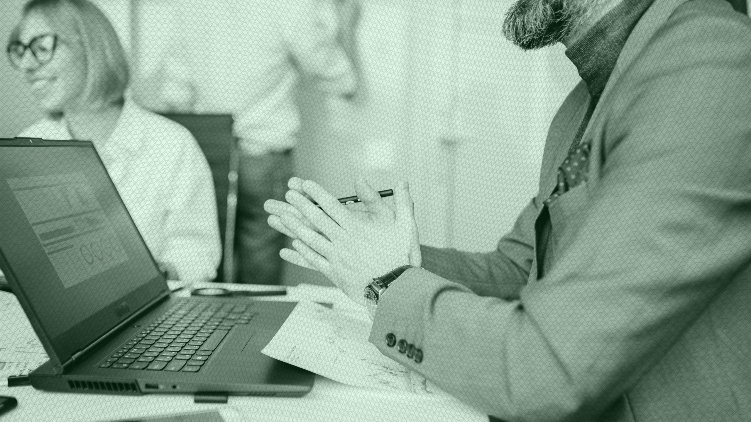 Photo of a person working on a laptop