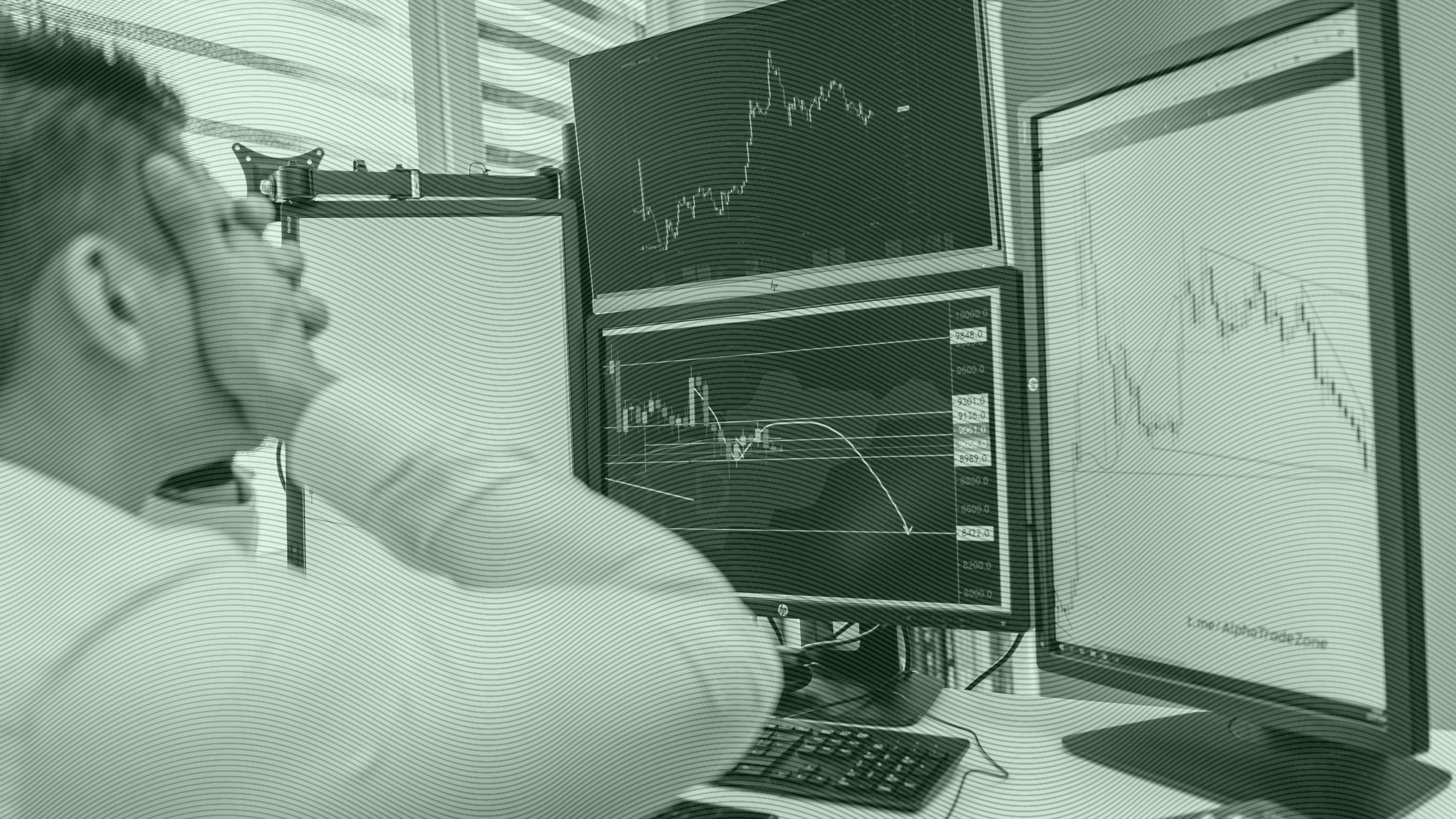 Photo of a frustrated advisor looking at stock charts