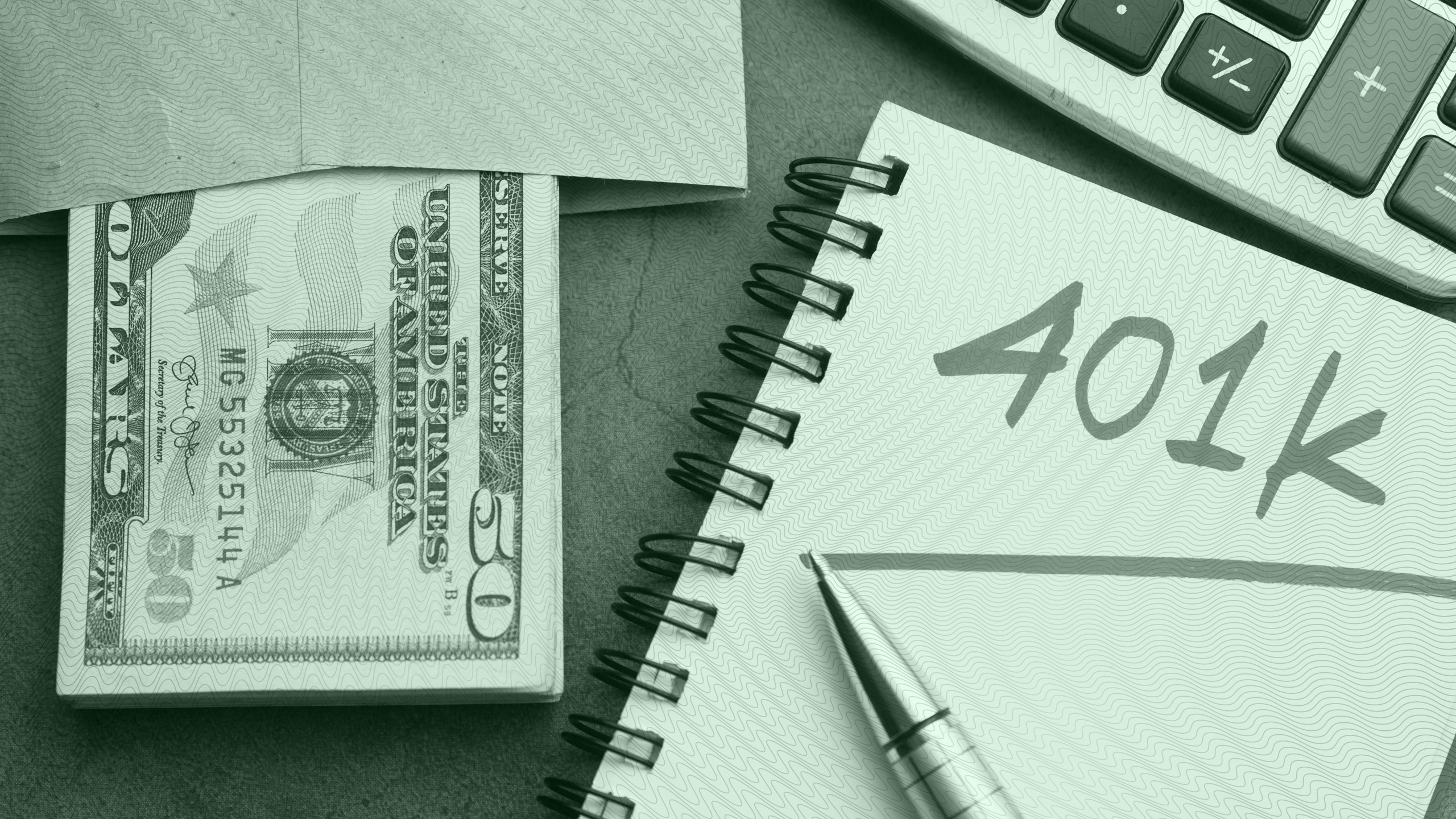 Photo of an envelope of money next to a notebook with "401k" written on it