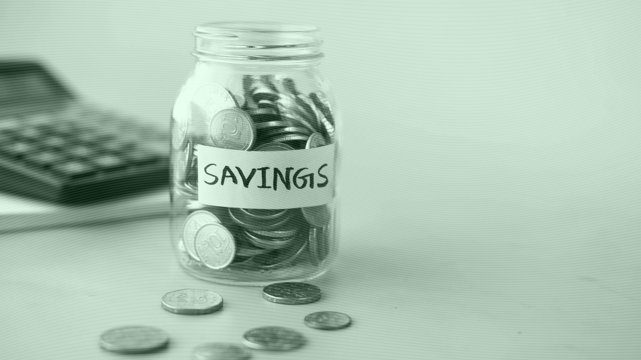 Photo of money in a savings jar