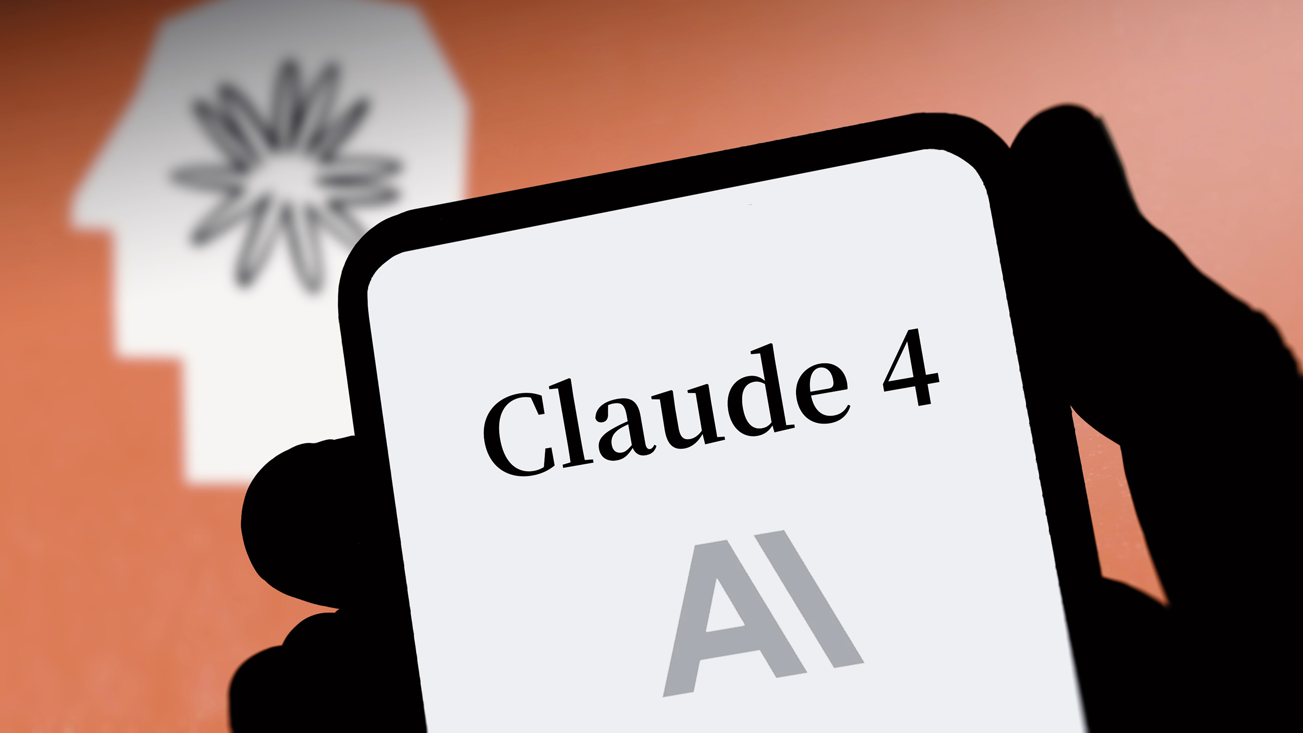 Photo of Claude and Anthropic logos