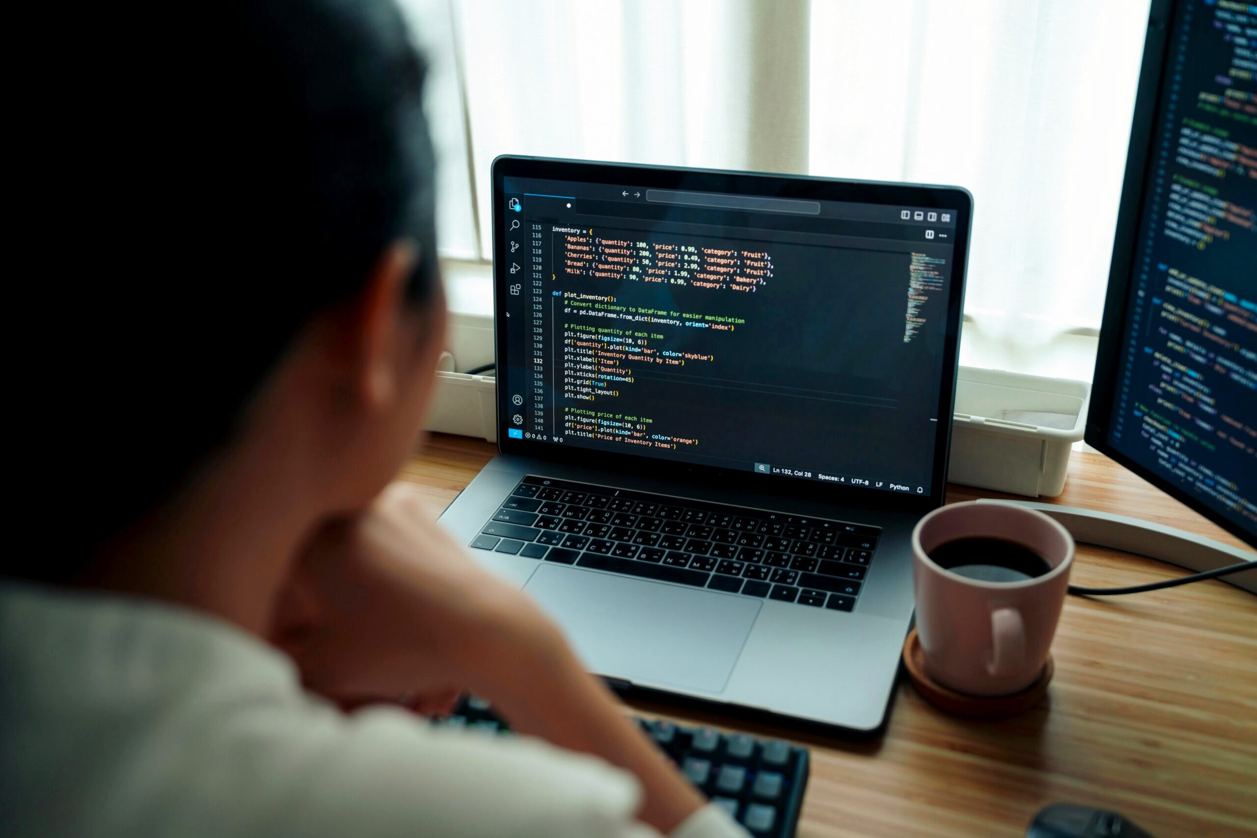 Programmer looking at code.