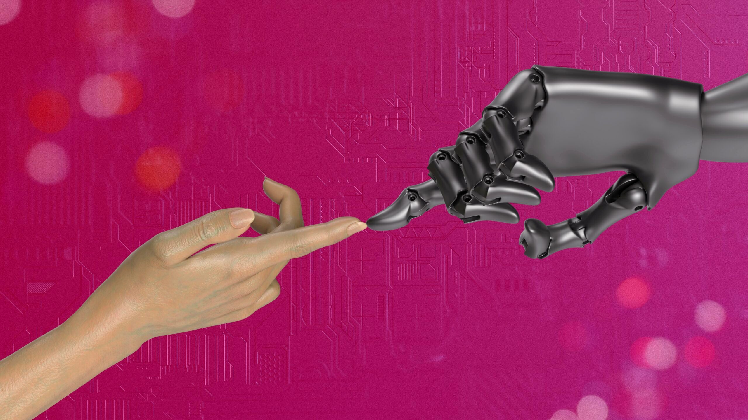 Image of a human and robot hand touching.