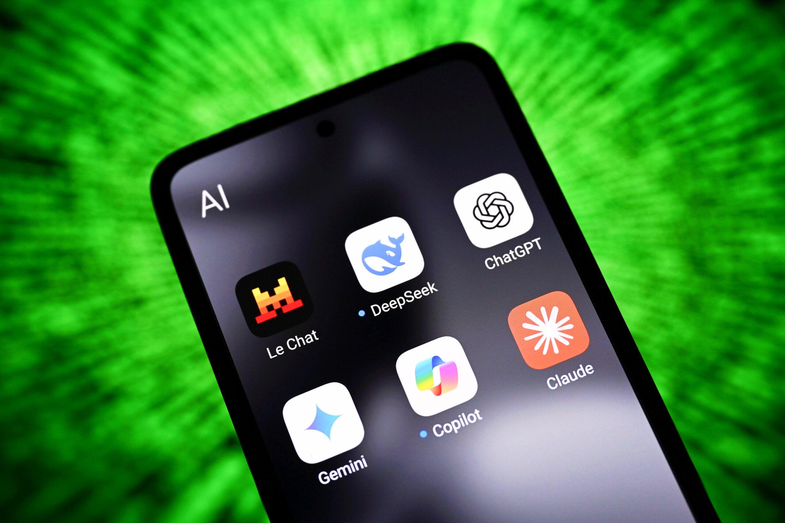 In this photo illustration, the artificial intelligence (AI) apps of Le Chat by Mistral AI, DeepSeek, ChatGPT, Google Gemini, Copilot and Claude AI by Anthropic are seen on a smartphone screen.