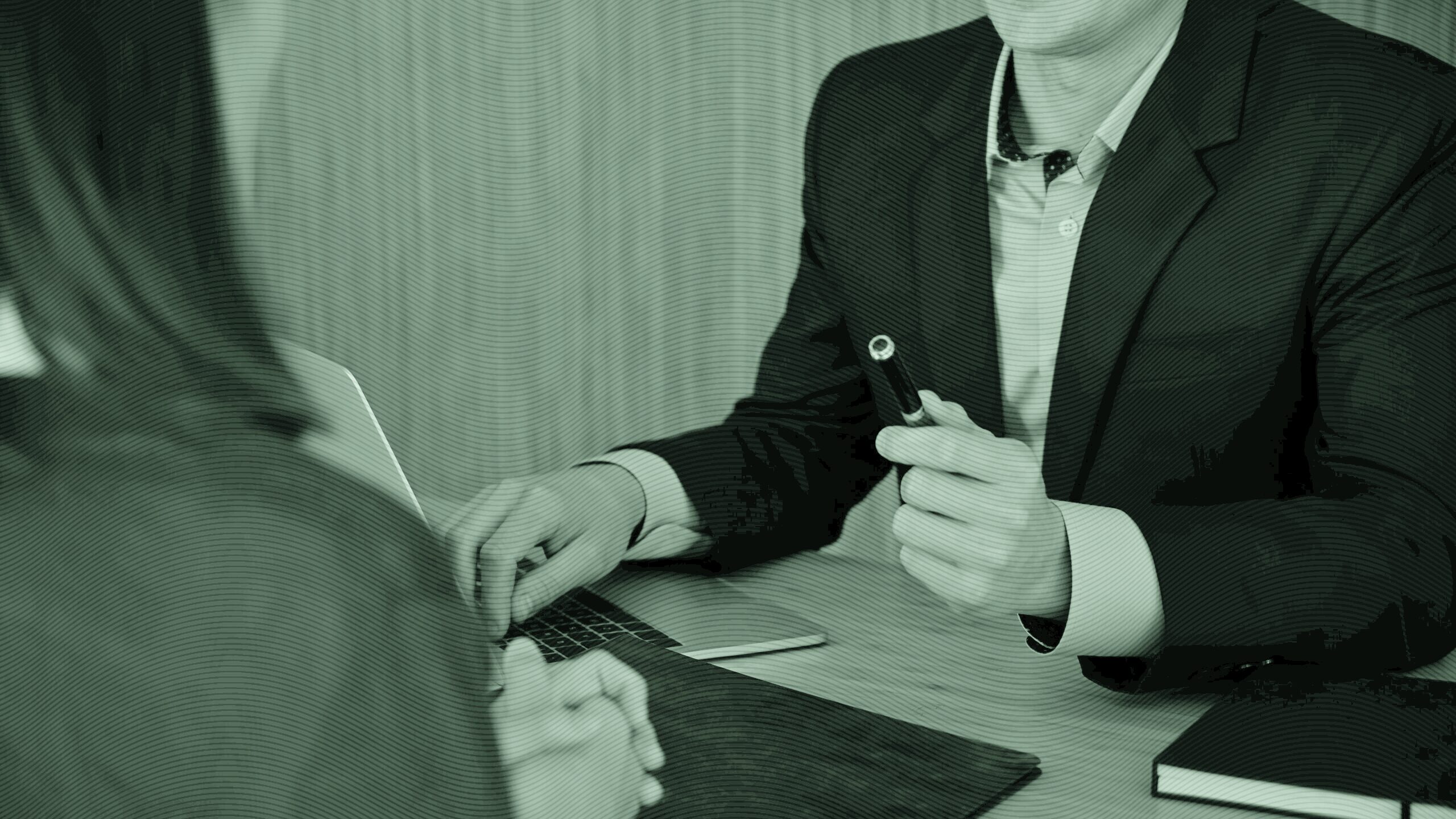 An advisor and client in a meeting.