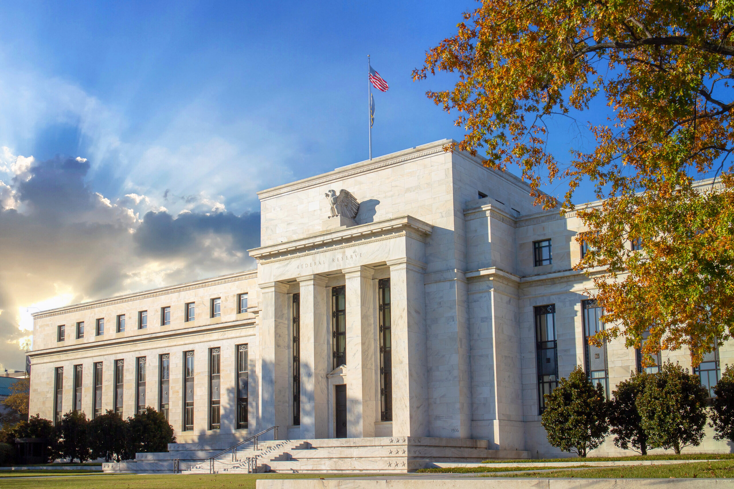 The Federal Reserve Building in Washington D.C. is shown on a sunny day.