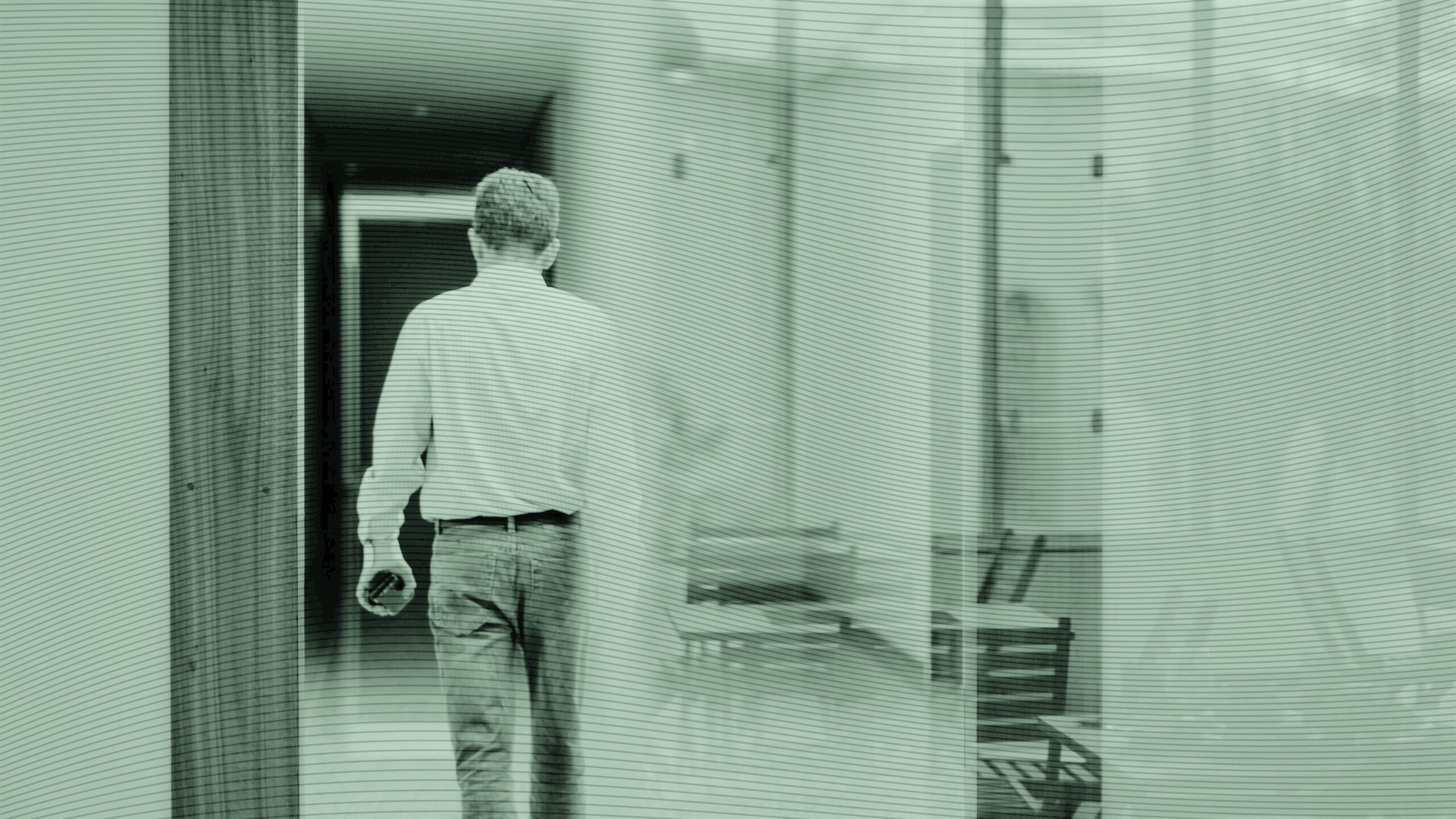 A man leaving an office.