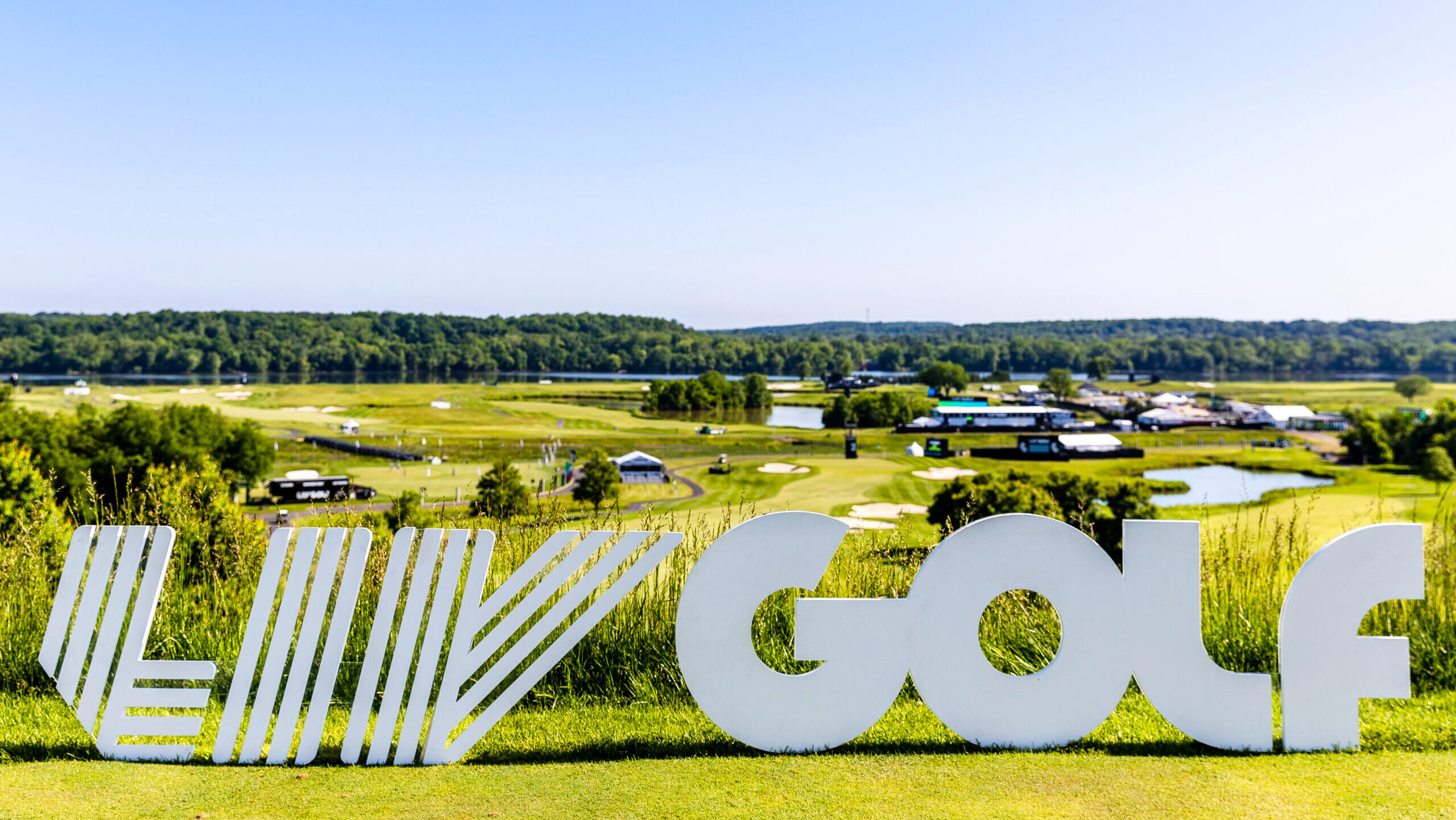 A photo of a LIV Golf logo at a golf event.