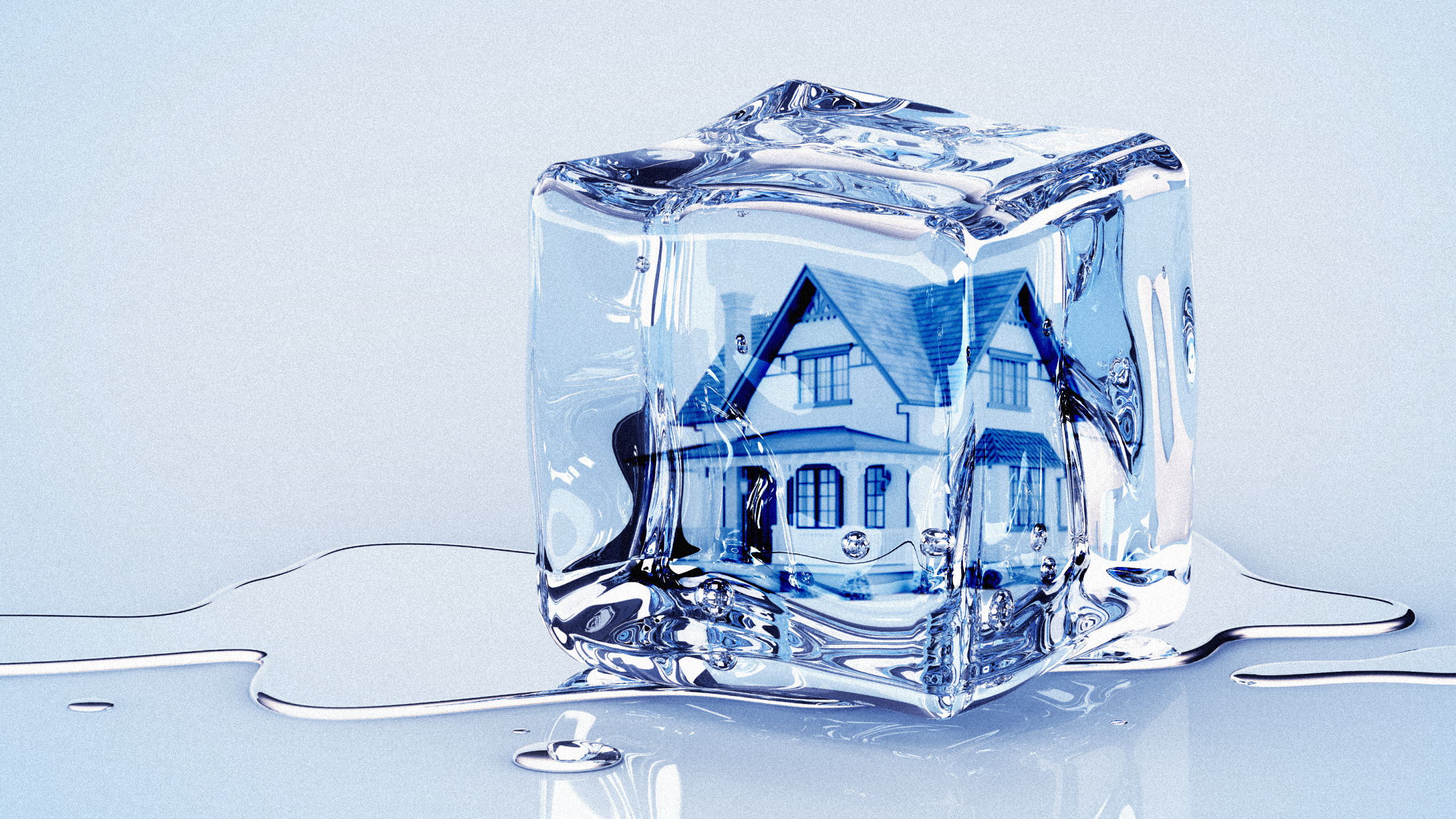 Photo illustration of a frozen house in an ice cube