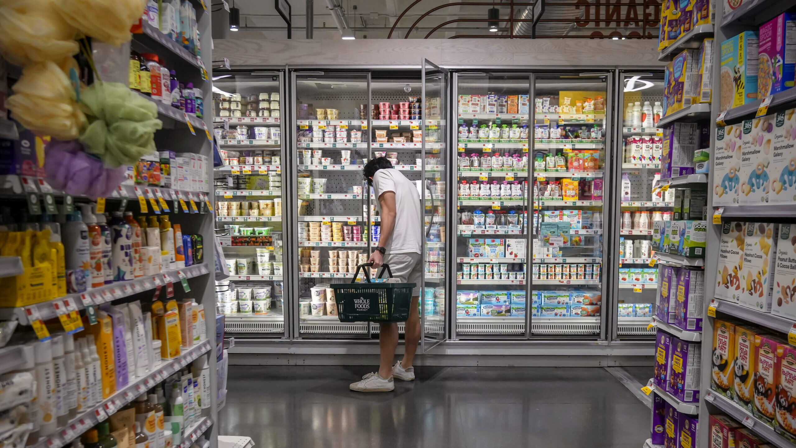 Photo of a man grocery shopping