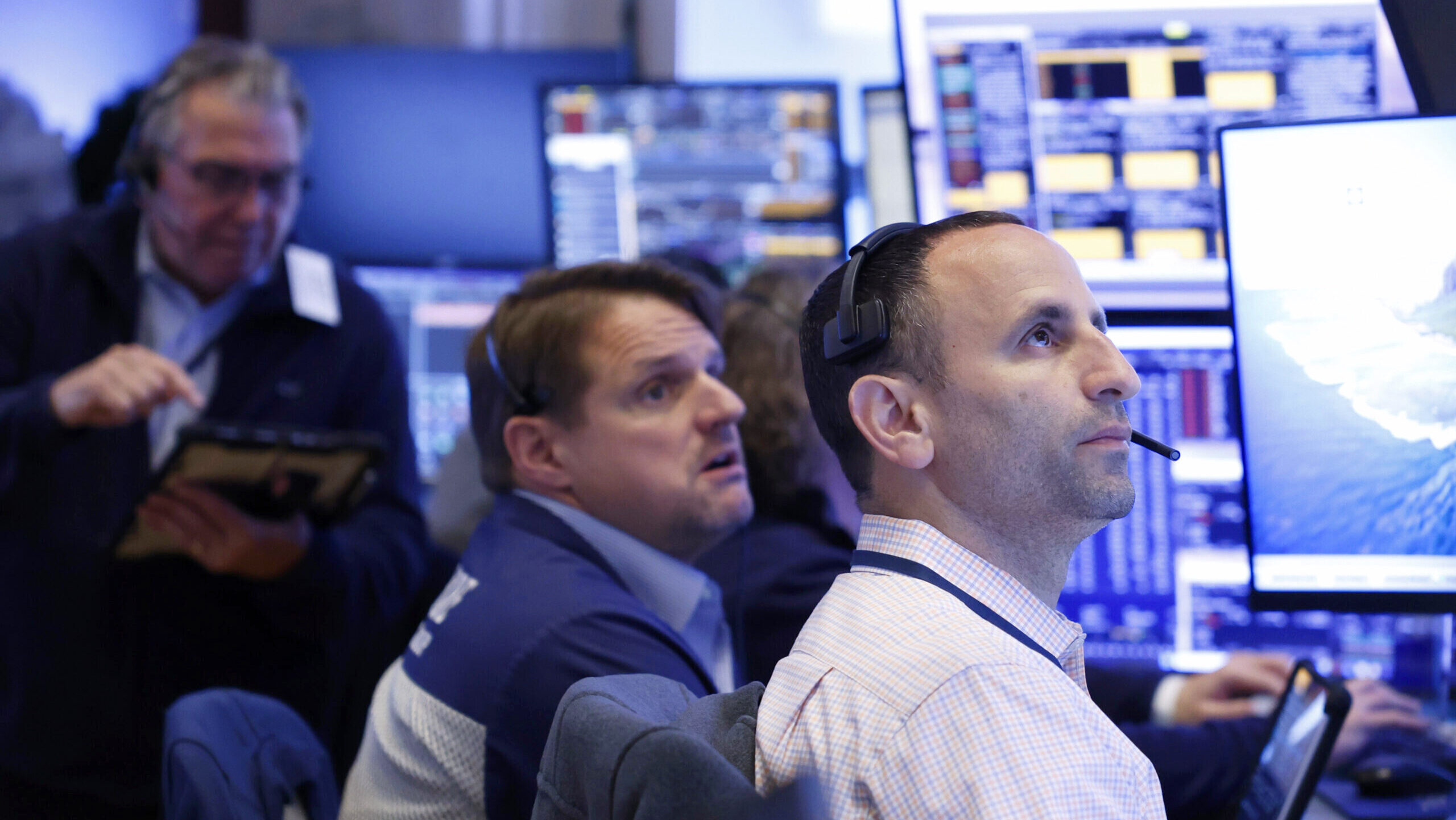 Photo of traders working on the floor of the New York Stock Exchange.