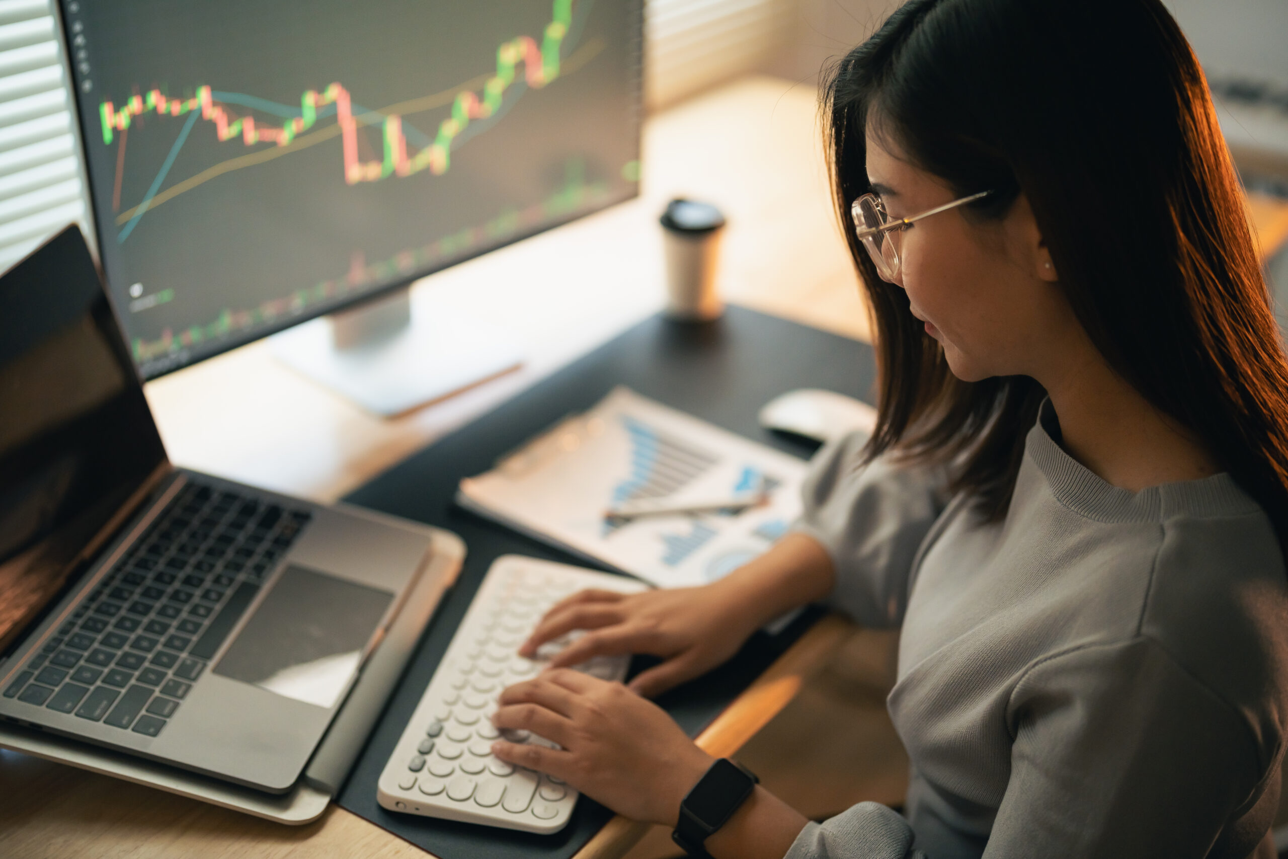 Woman at a computer.