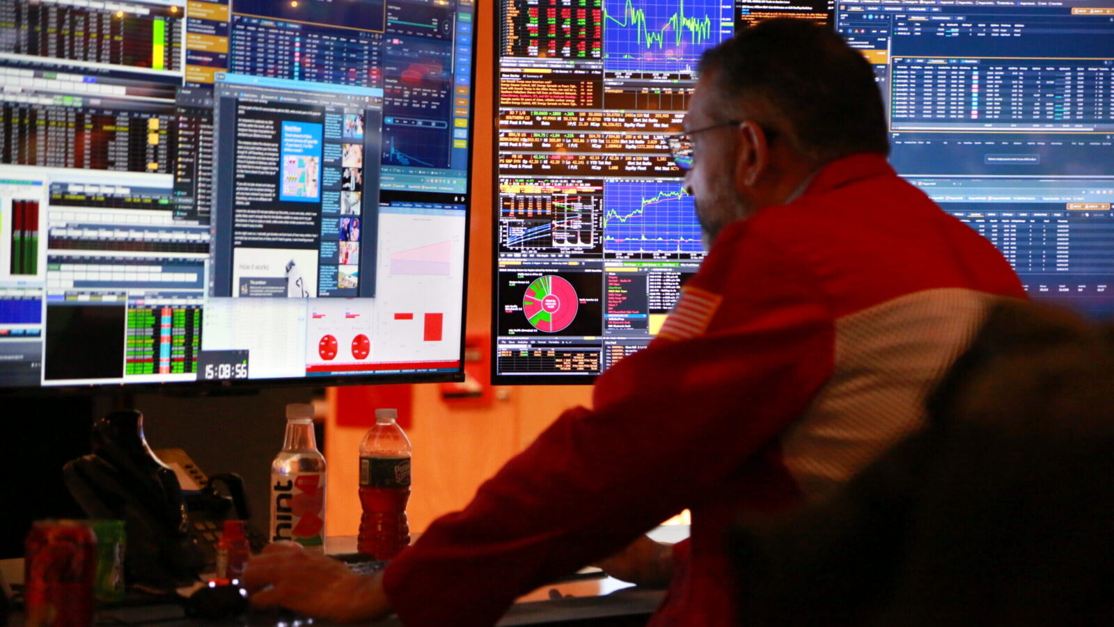 A trader works on the floor of the New York Stock Exchange in New York.