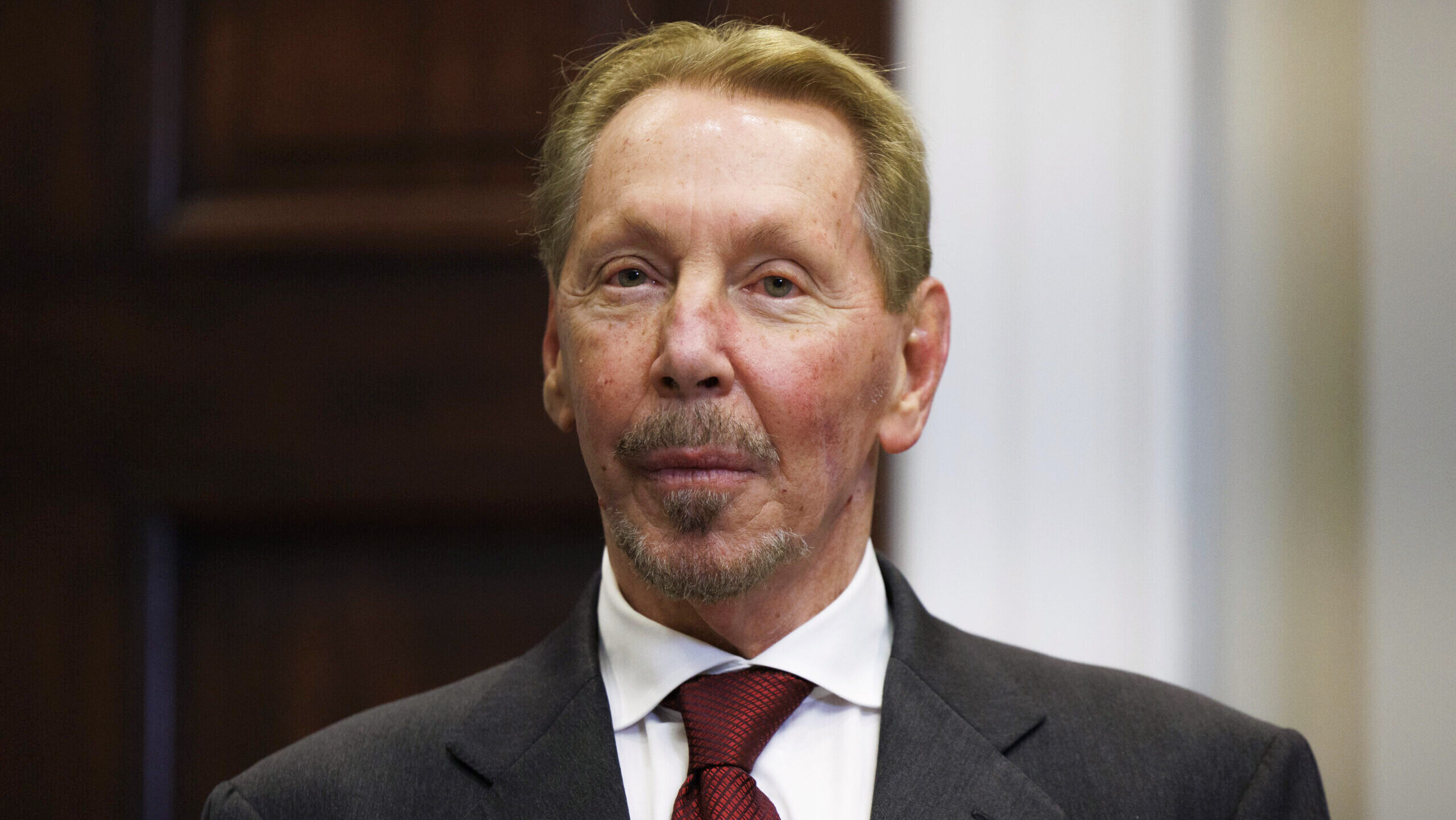 Oracle CEO Larry Ellison is shown standing in the White House in Washington, D.C.