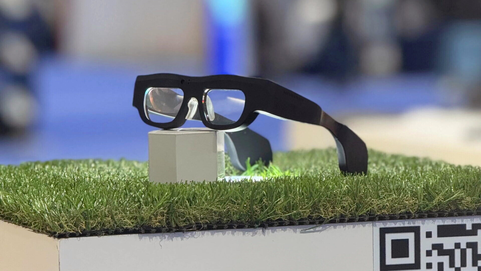 A pair of Science Corporation's PRIMA Glasses are shown on a display table.