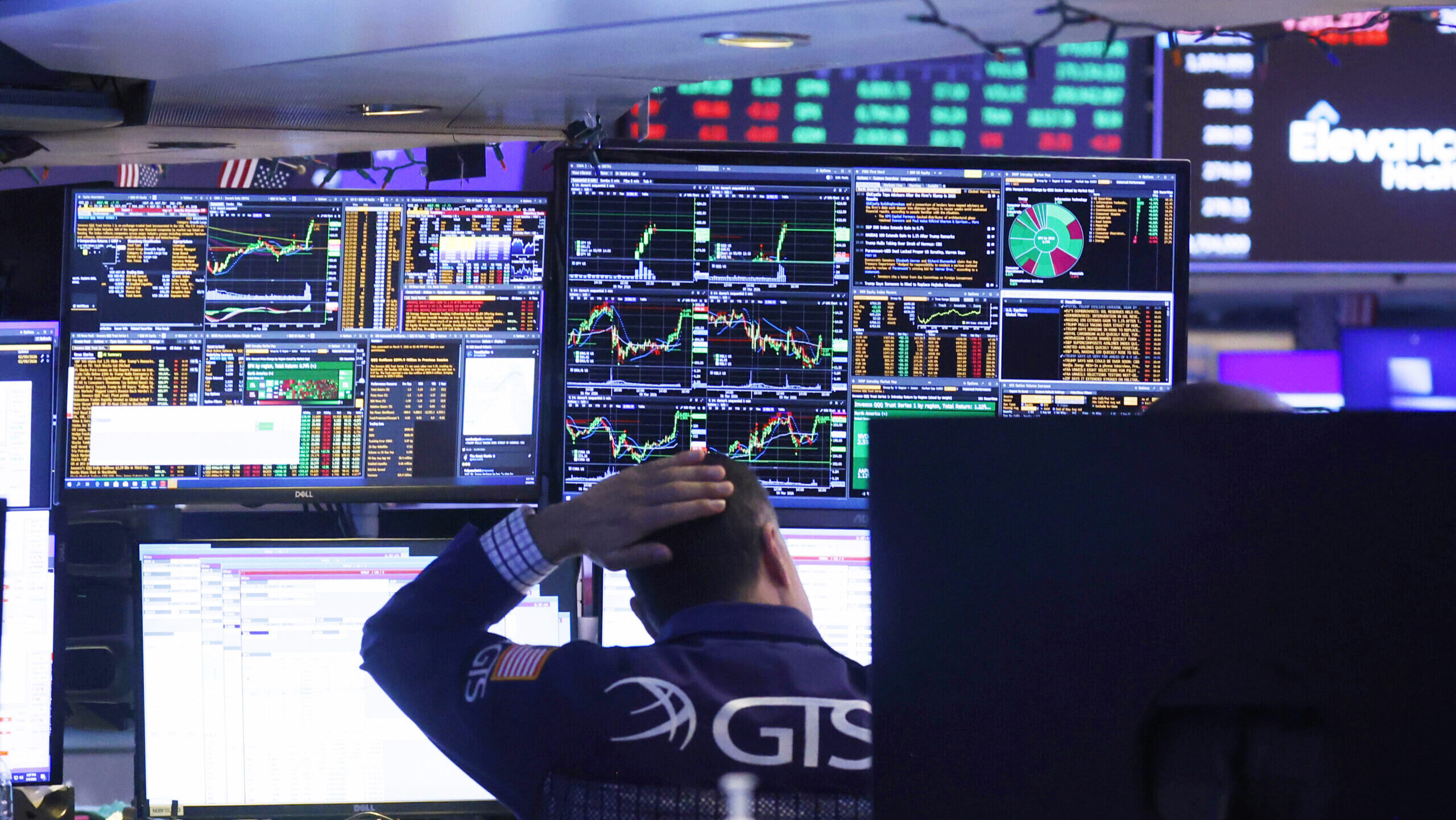 Photo of a trader working on the New York Stock Exchange floor.