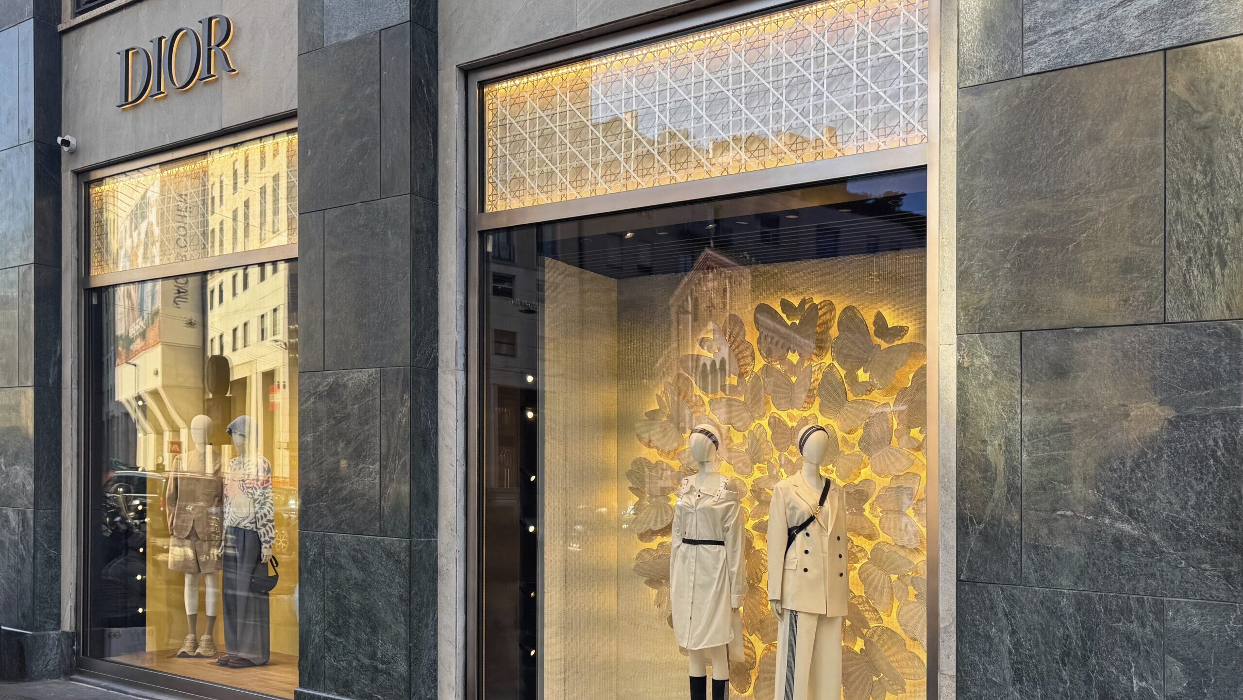Christian Dior storefront featuring display windows.