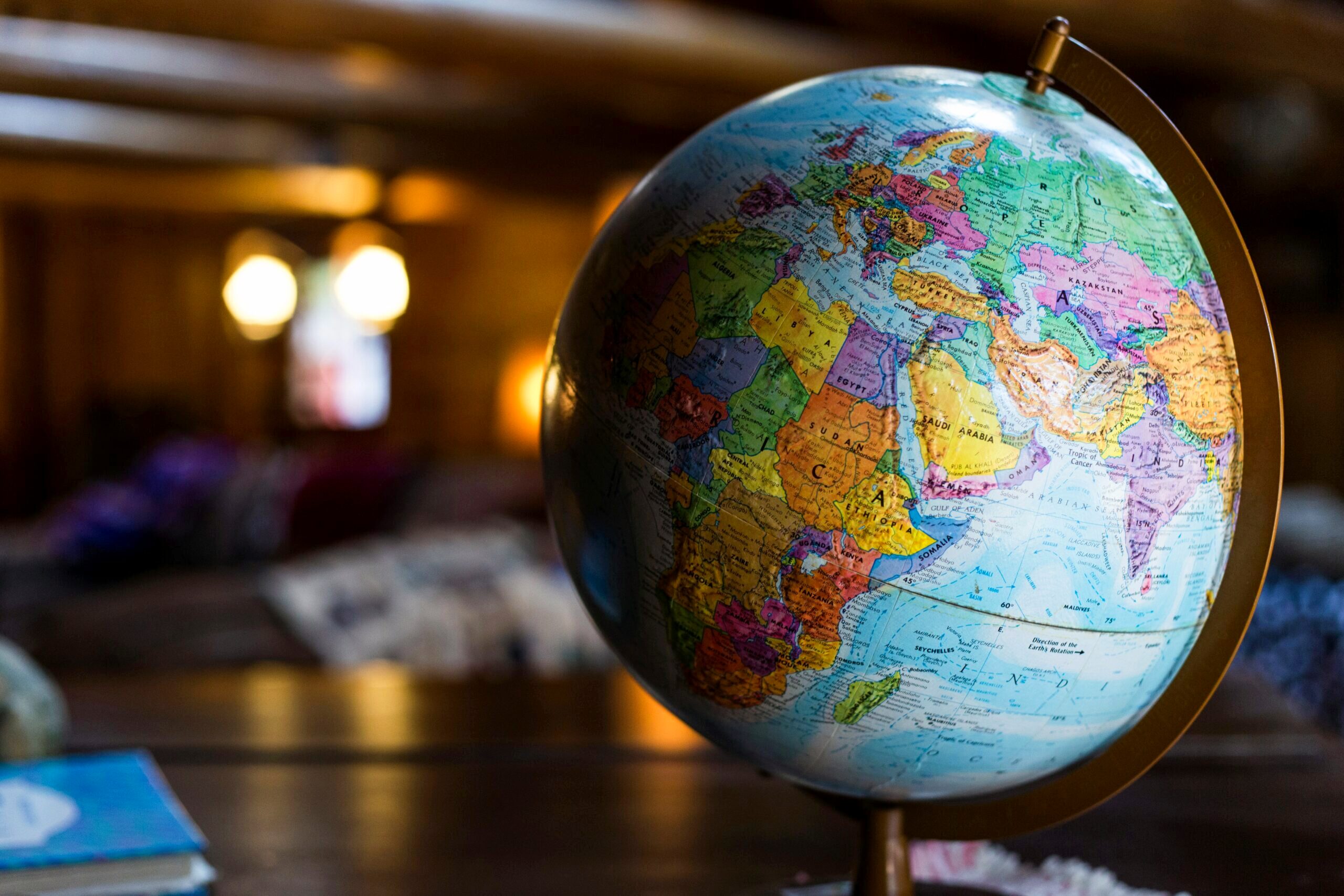 Picture of a globe sitting on a table.