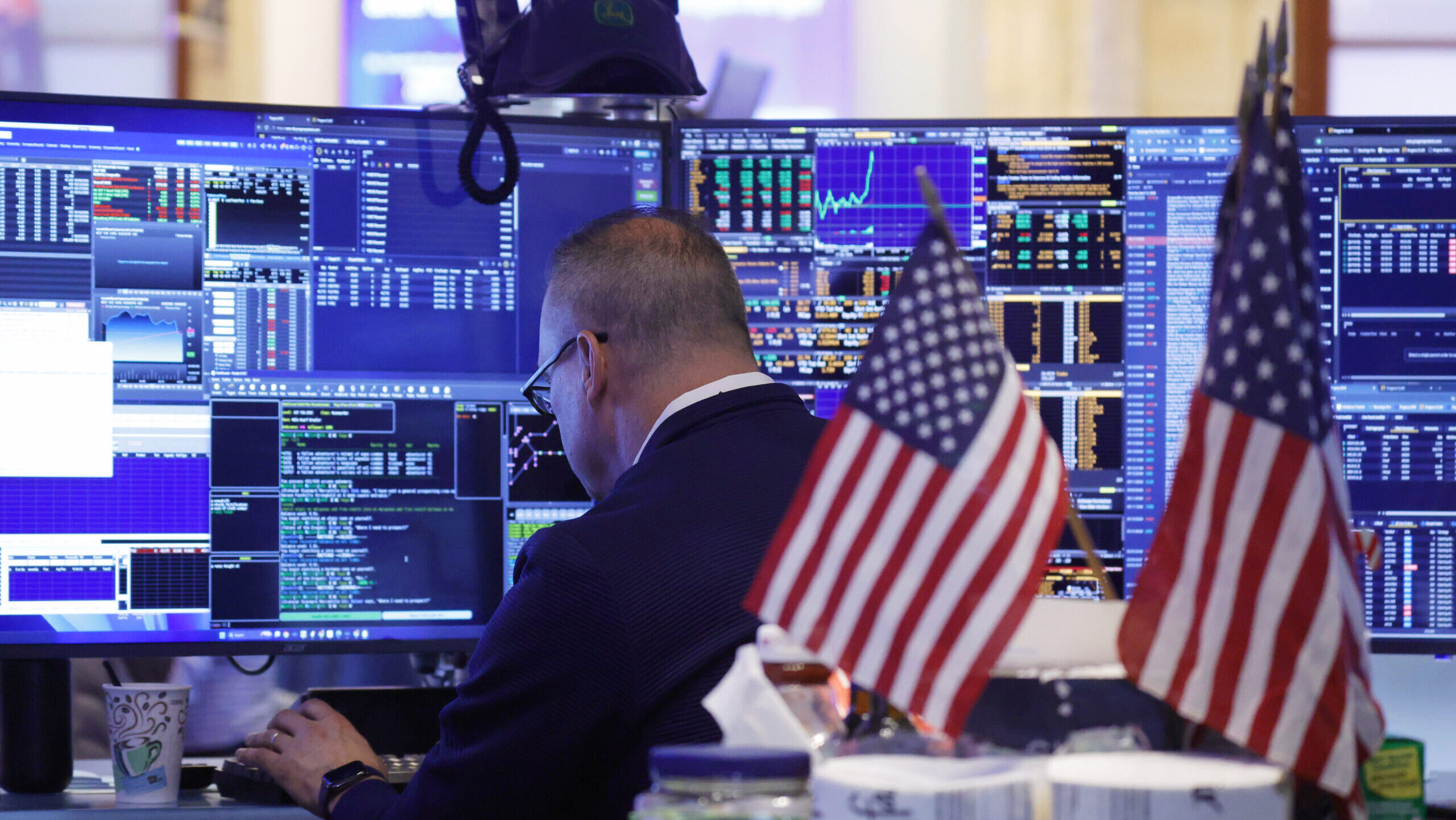Photo of a trader working on the New York Stock Exchange floor.