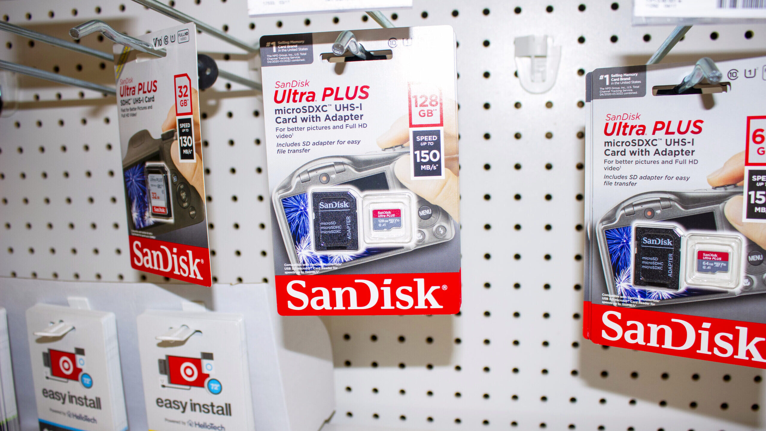 Photo of Sandisk memory cards on display at a supermarket.
