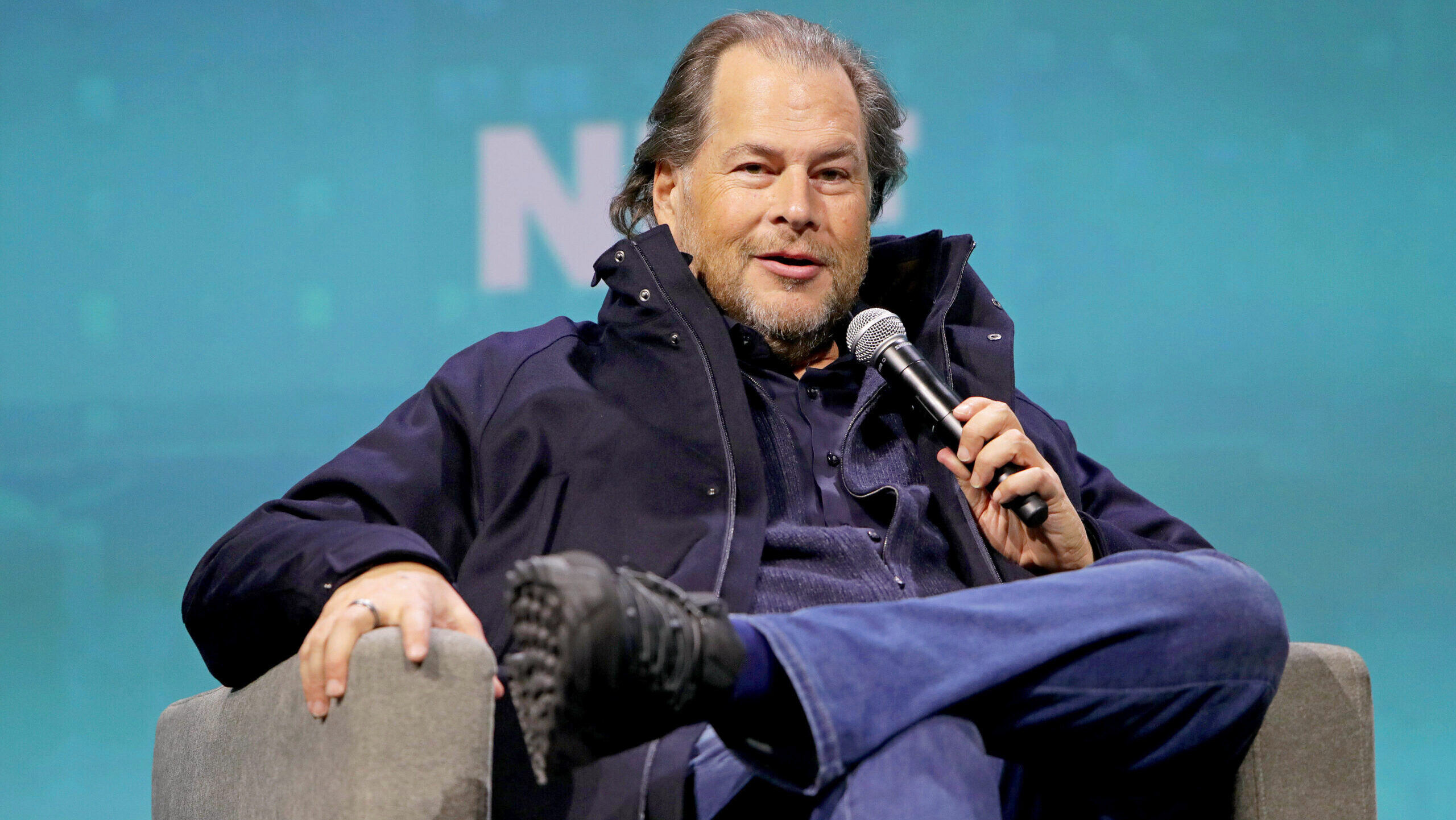 Marc Benioff, Chair and CEO of Salesforce speaks at a conference.