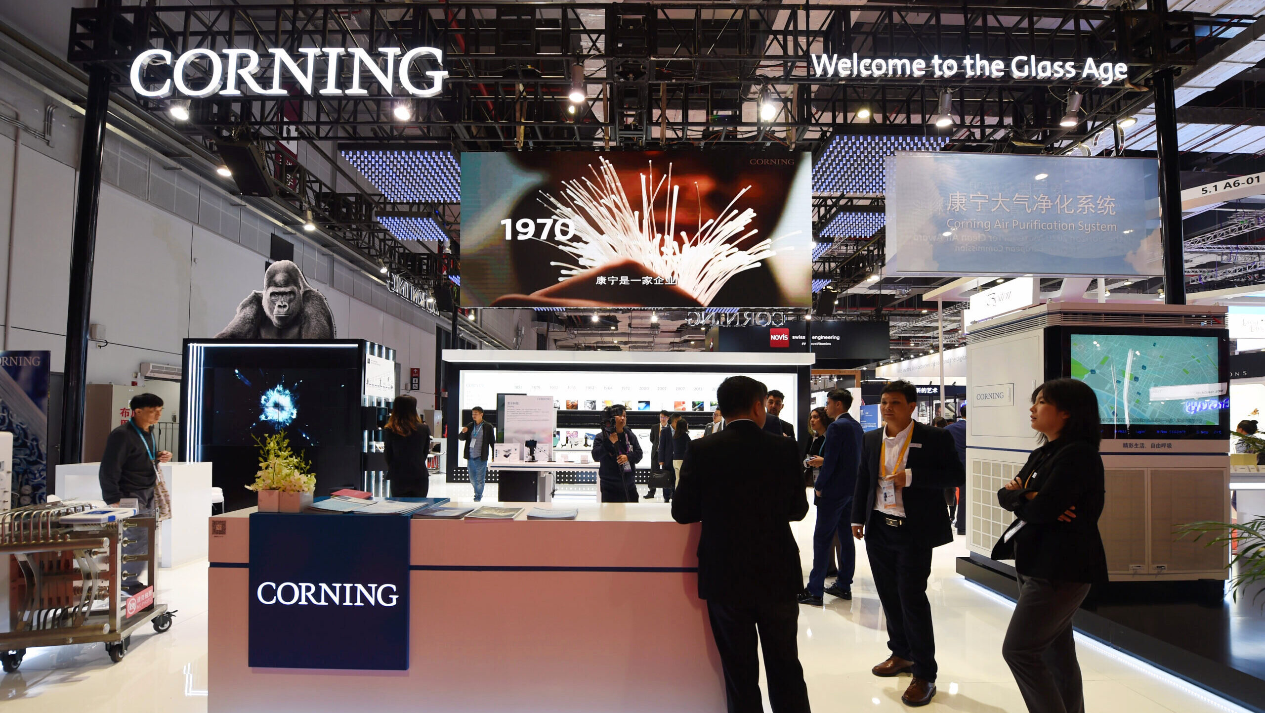Photo of a Corning booth at a tech confrence floor.