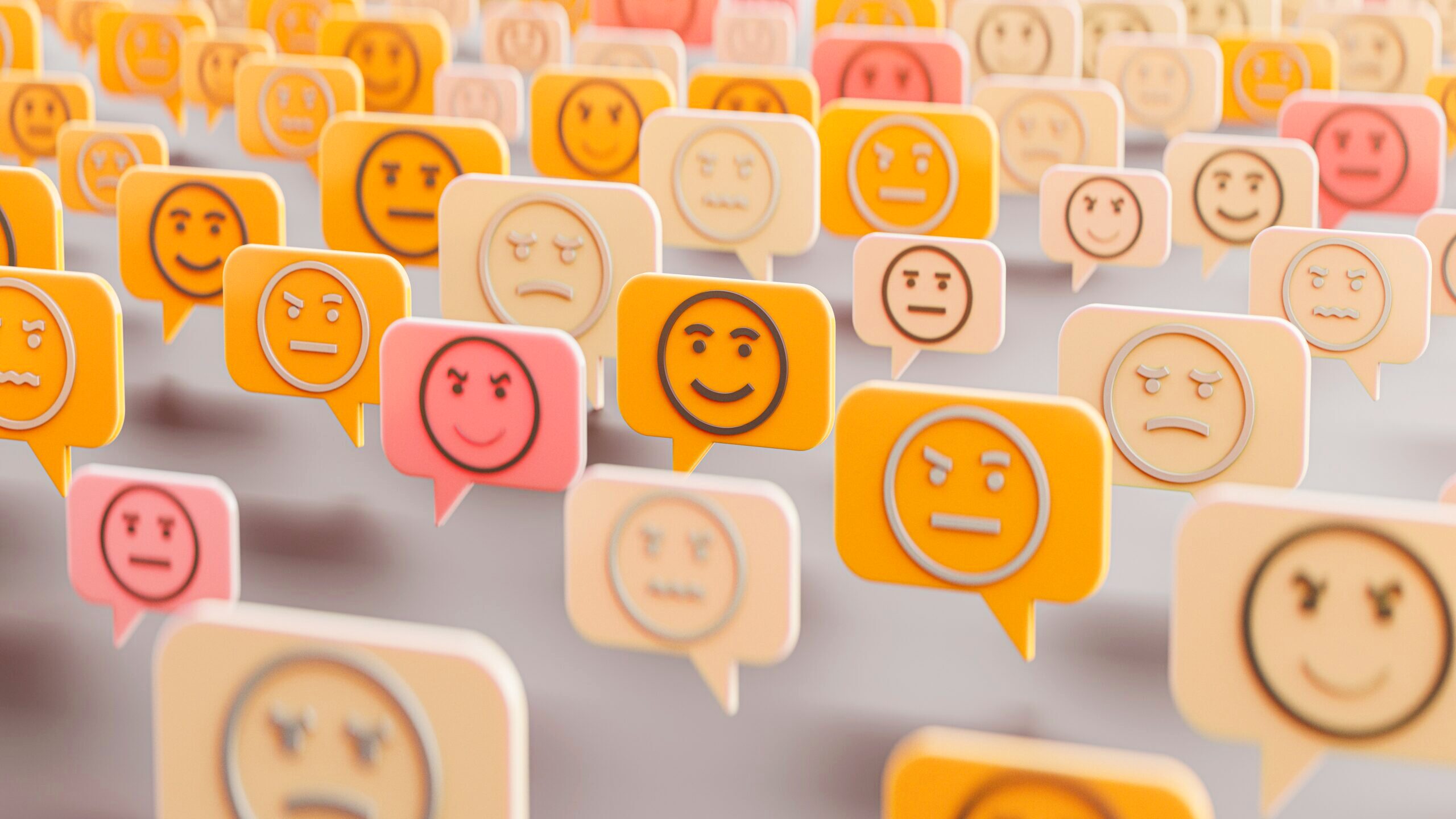 An abstract picture with many emoji faces of different emotions.
