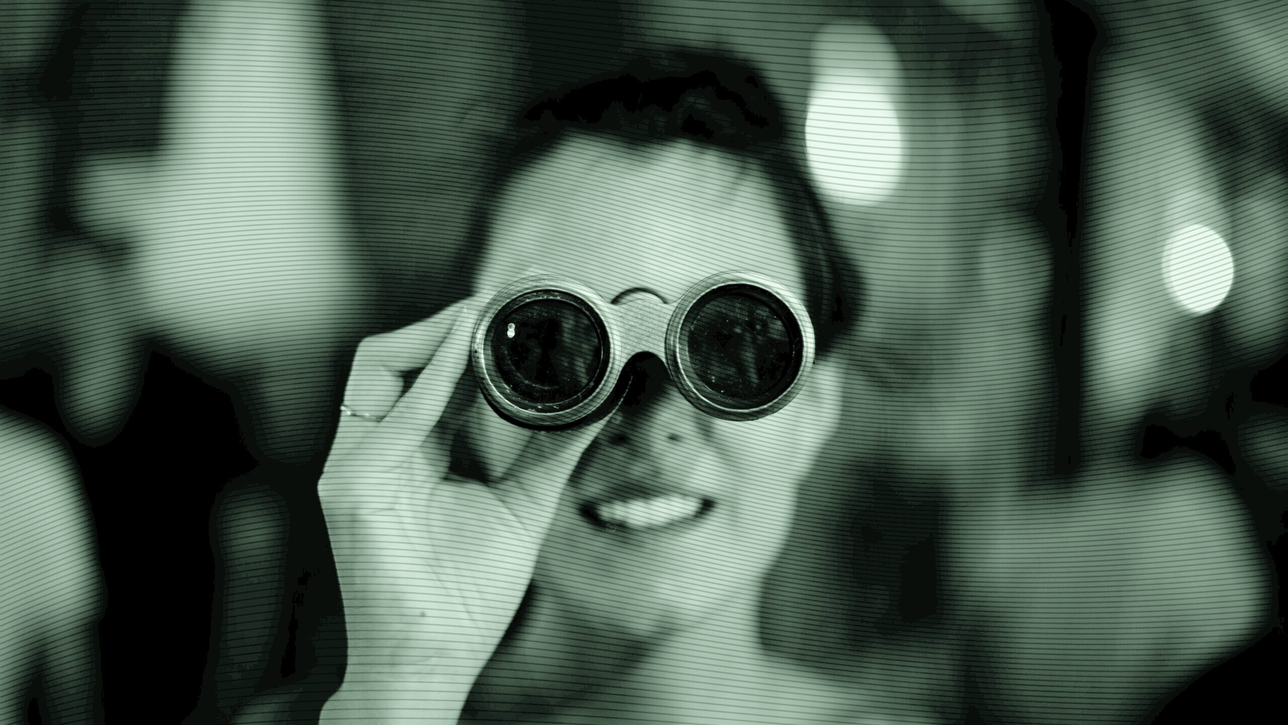 A woman with binoculars.