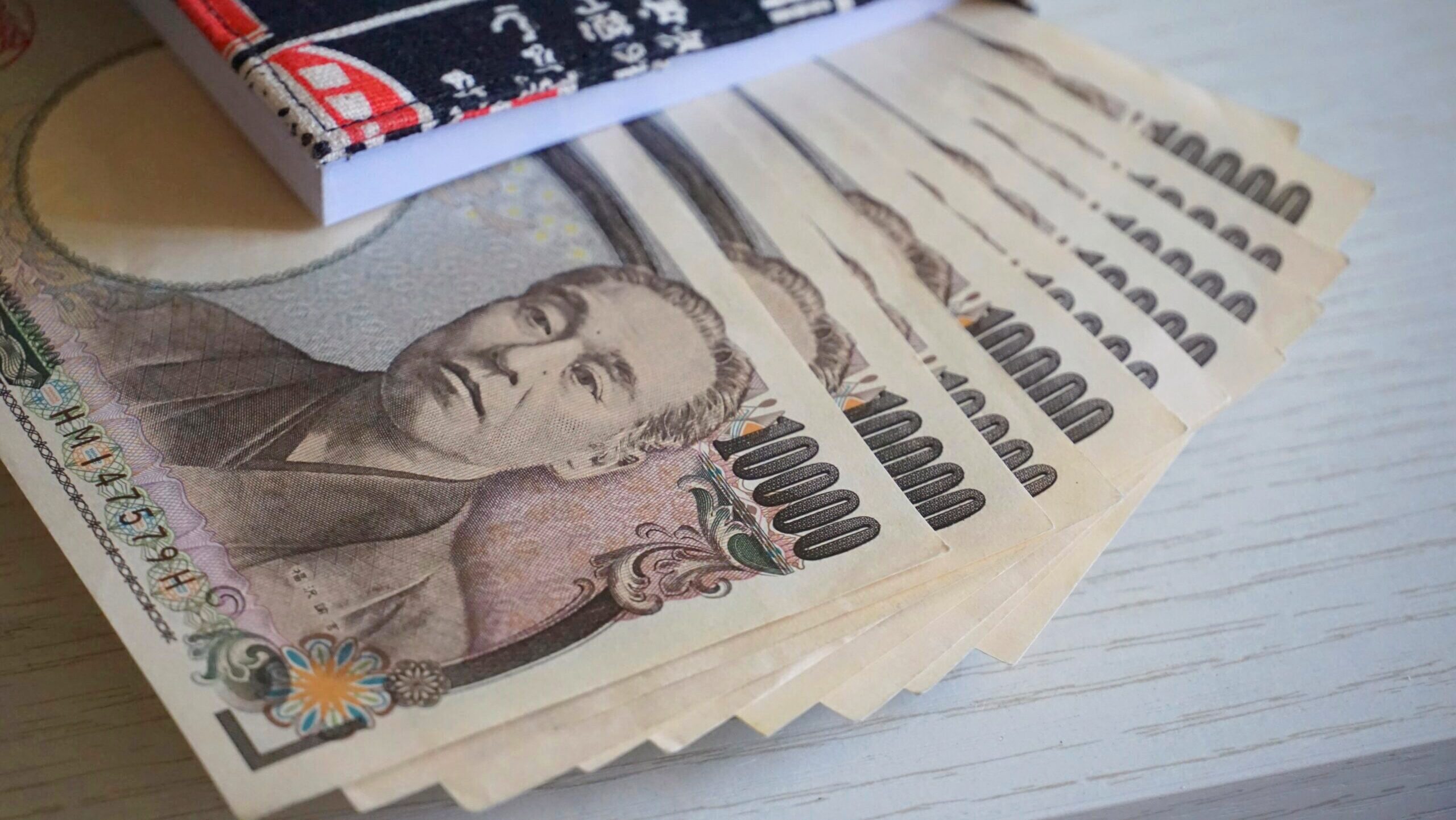 A stack of 10,000 yen notes.
