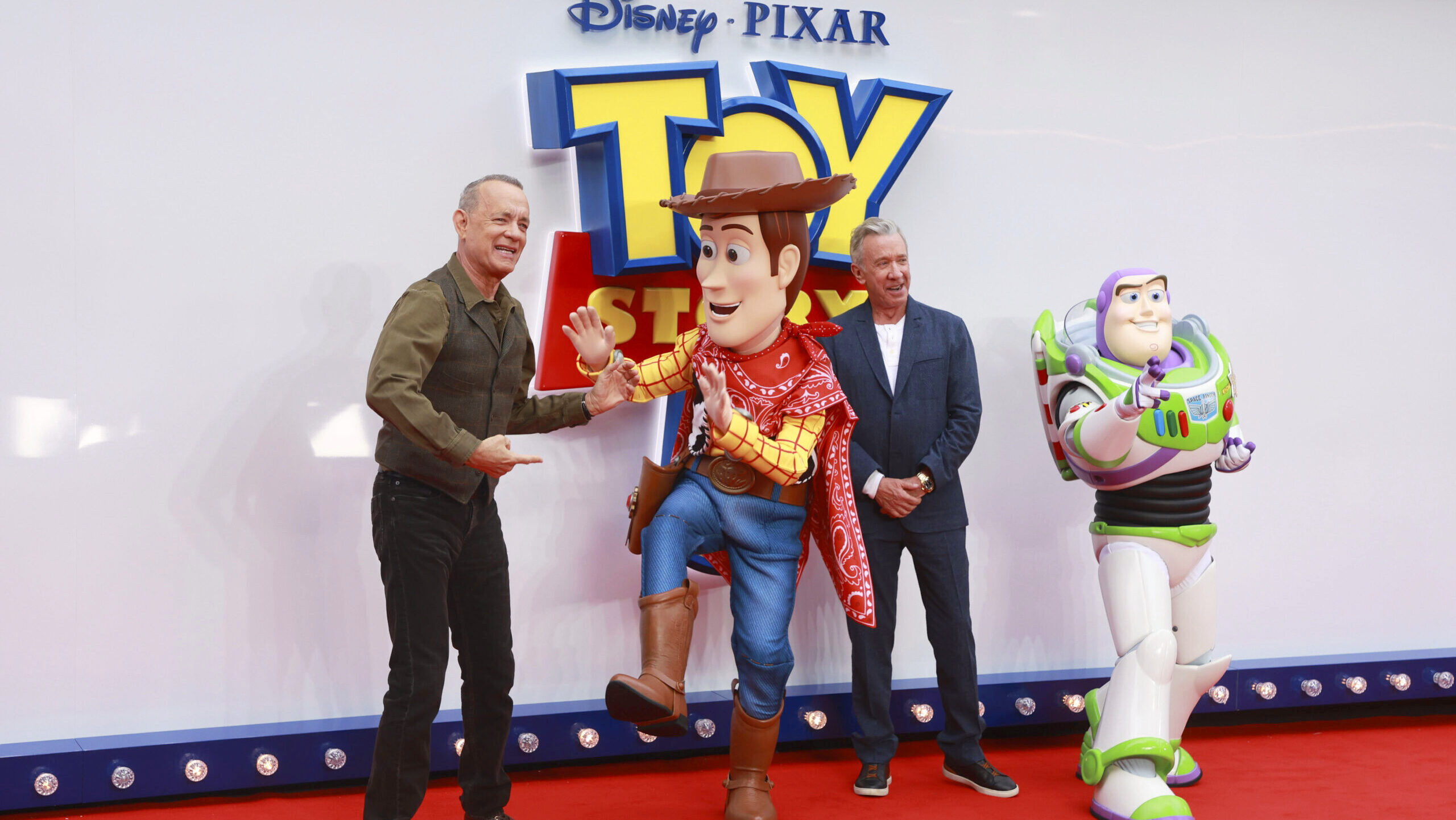 Photo of Tom Hanks and Tim Allen at the Toy Story 5 premiere.