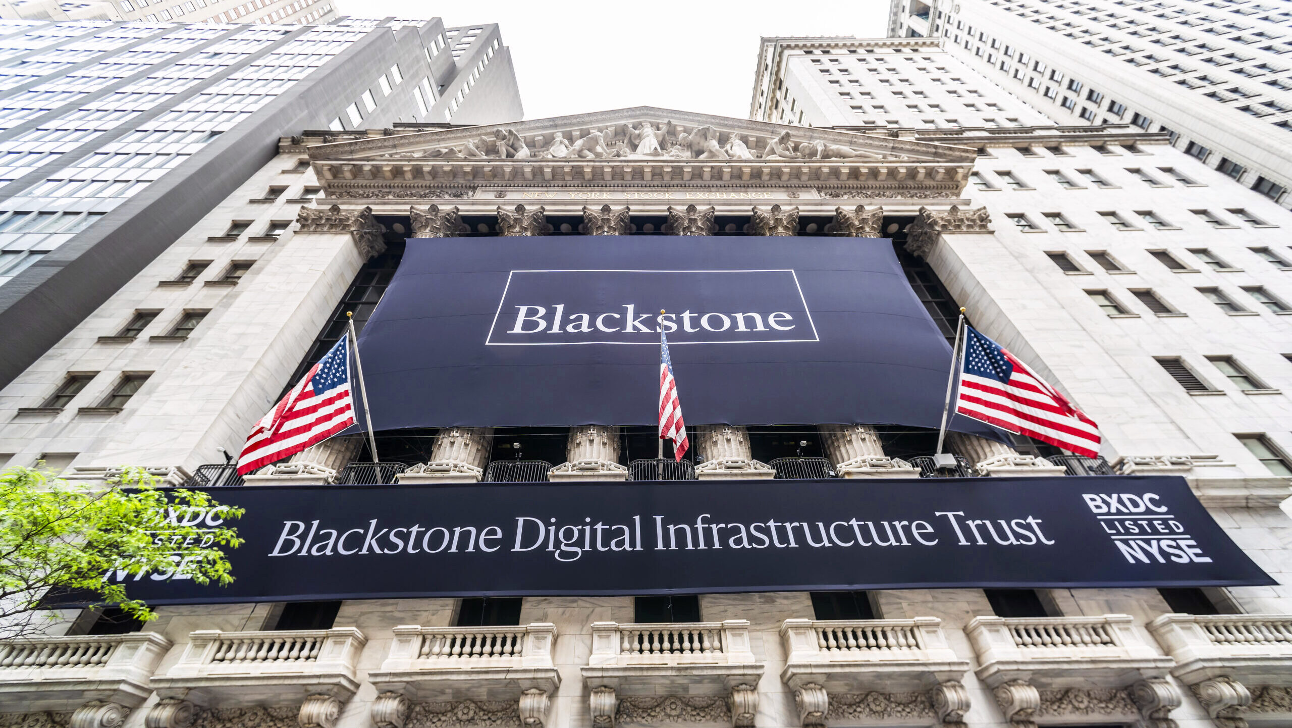 Photo of a Blackstone banner outside the New York Stock Exchange.
