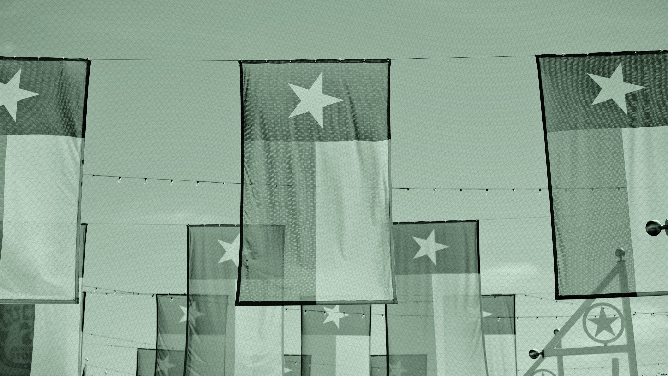 A bunch of Texas flags.