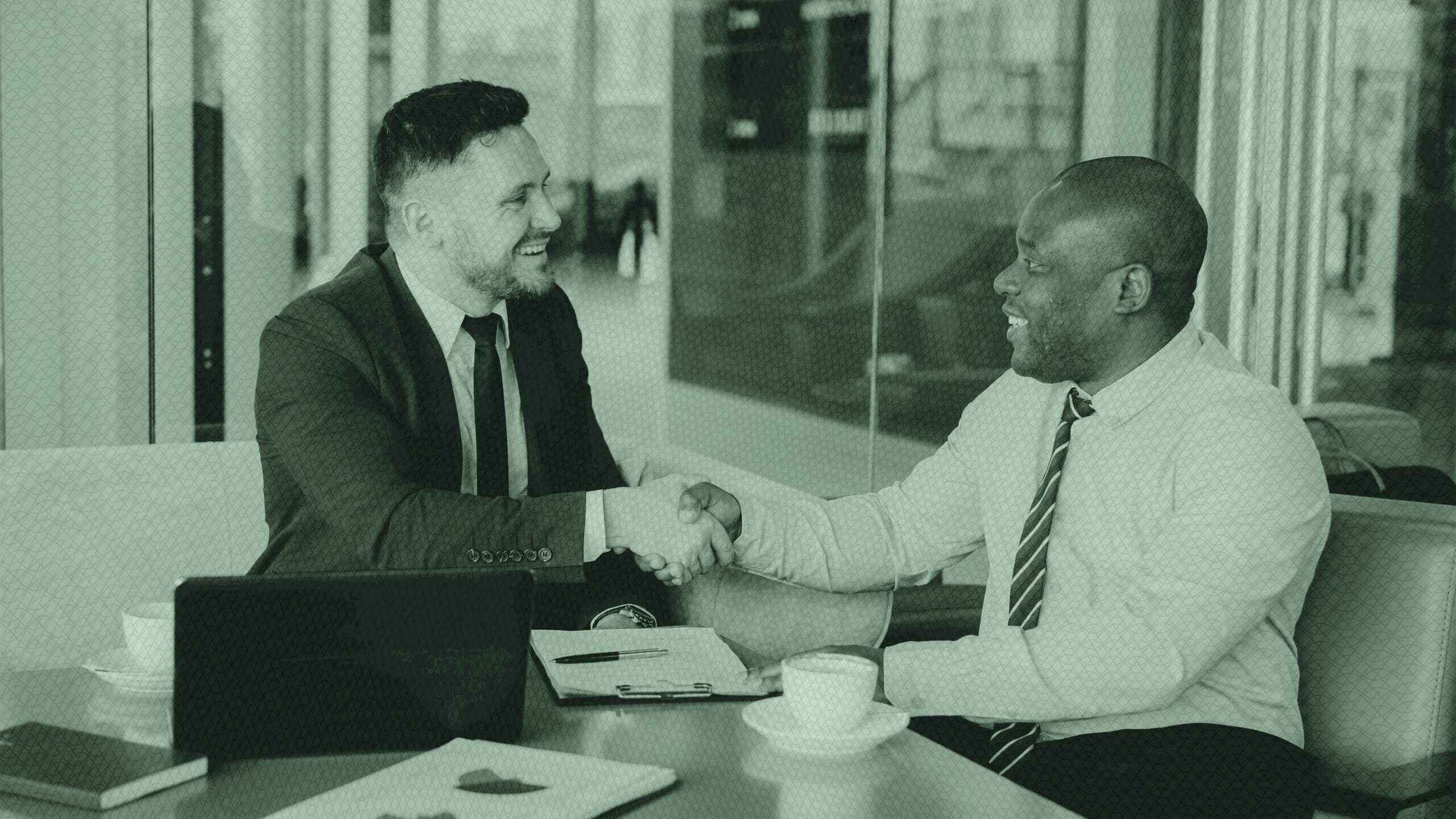 Two businessmen shaking hands.