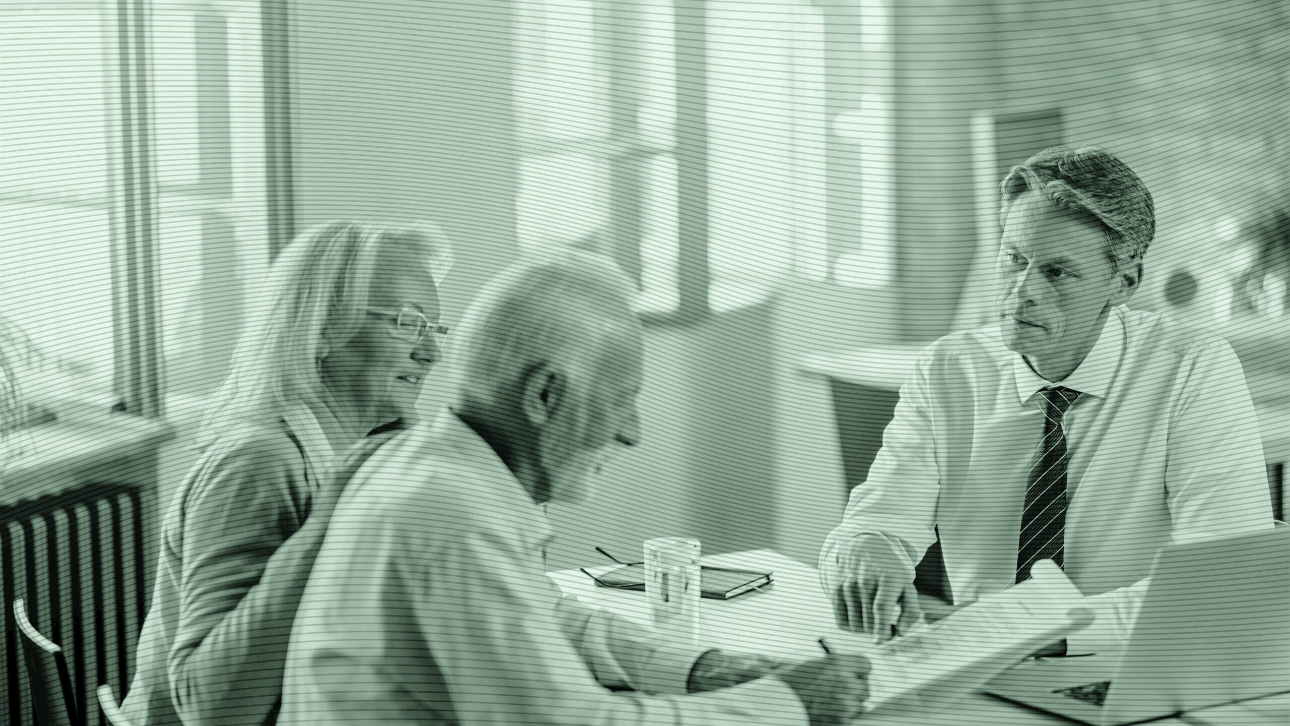 advisor helping couple with estate plan.