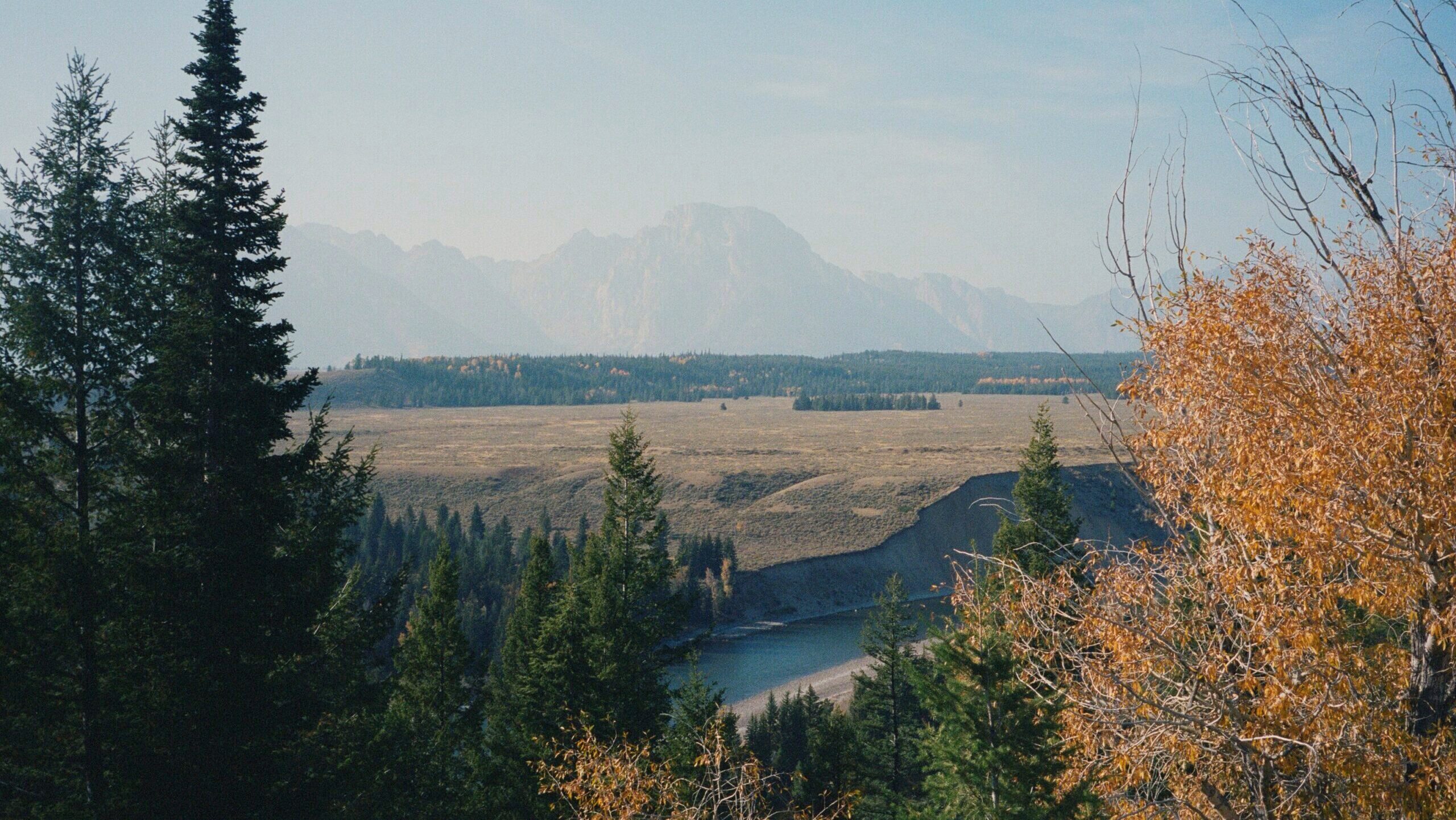 A view of the Grand Teton mountains near Jackson Hole, Wyoming is shown.